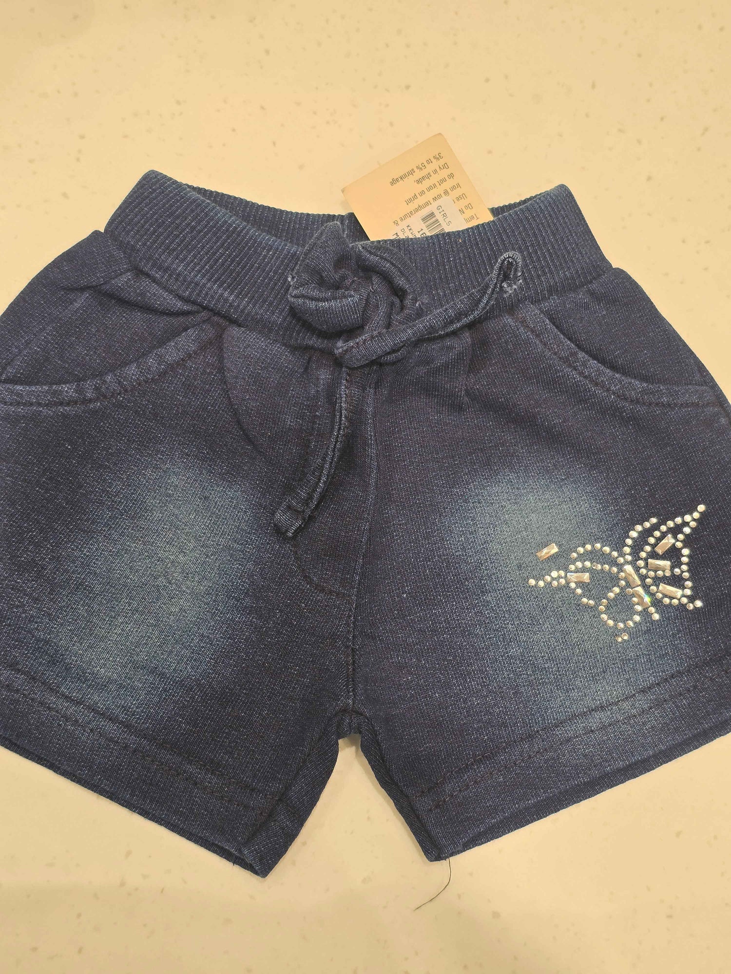 Denim cotton material blue color shorts with butterfly design