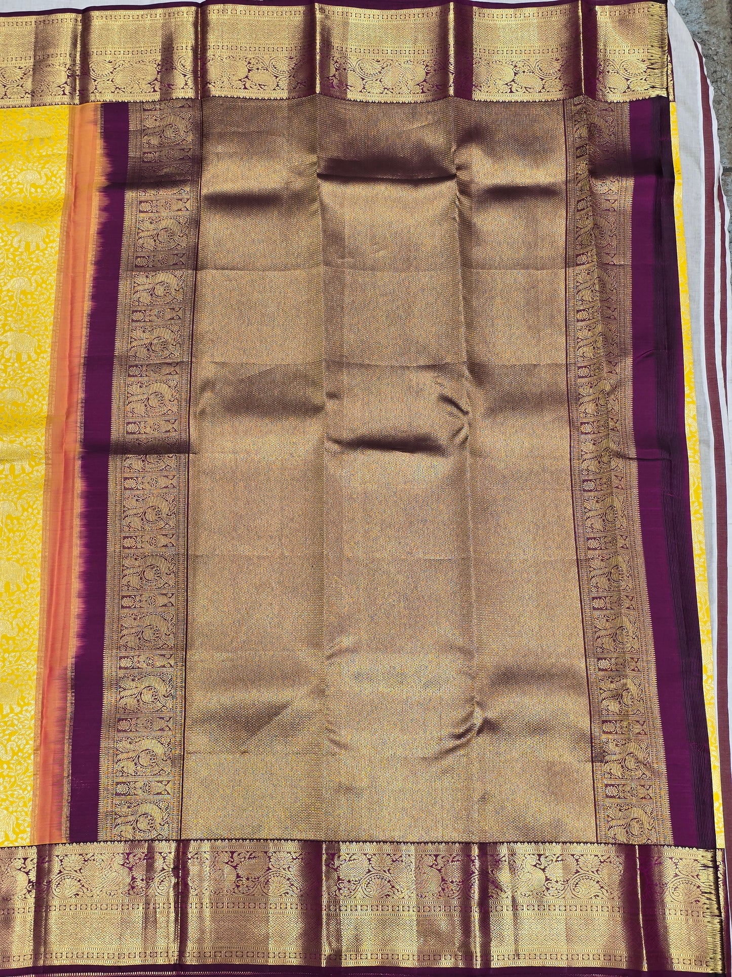 Pure  handloom Kanjivaram brocade silk saree with traditional border and contrast blouse