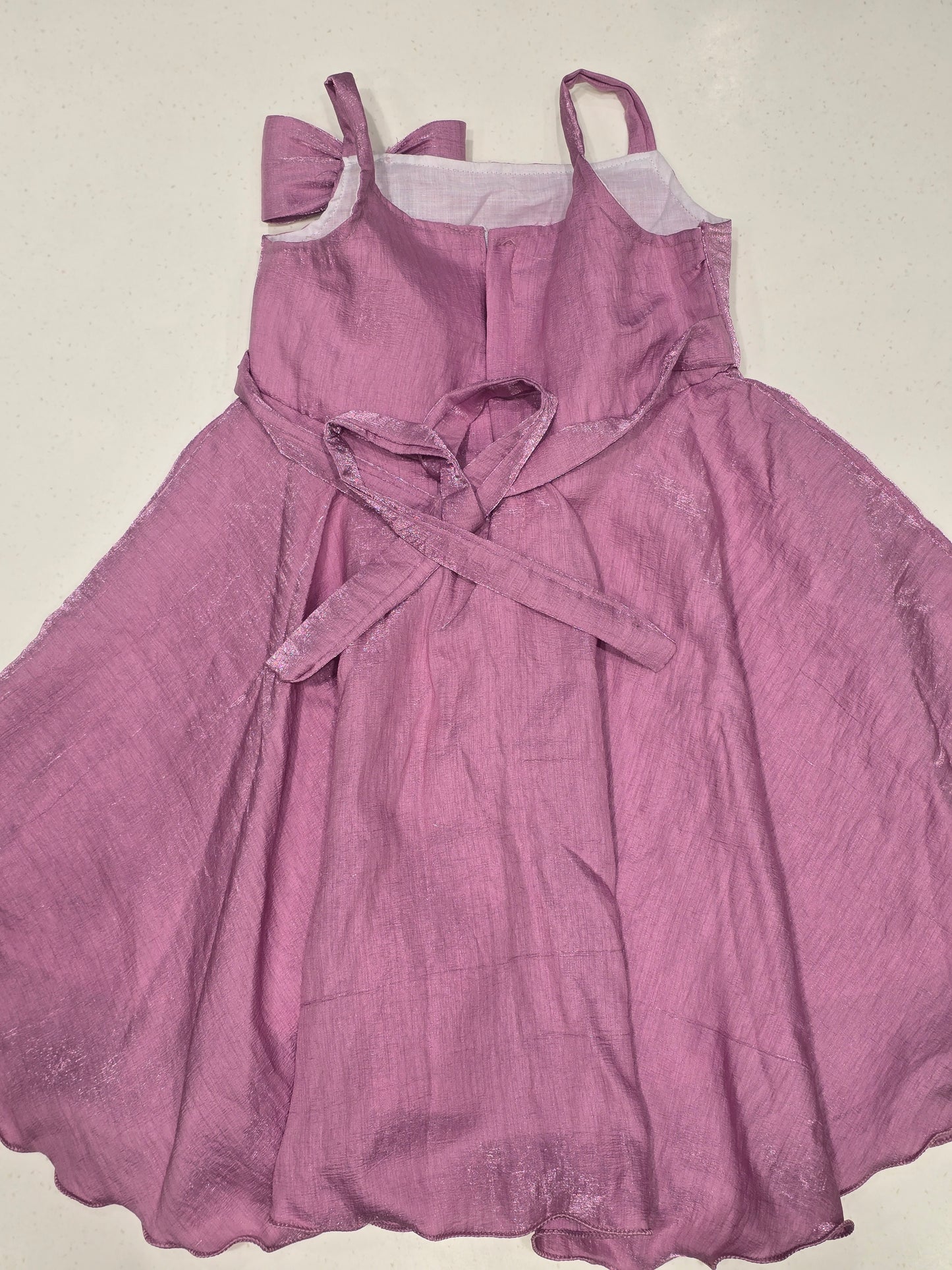 Shimmer material onion oink color baby frock with designer bow