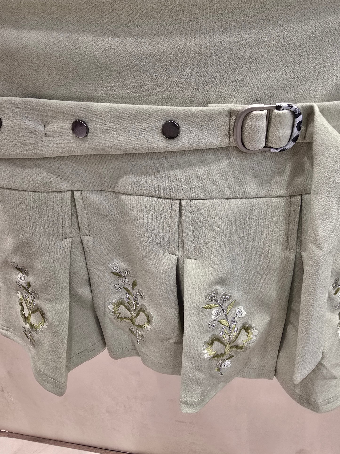 Girls Lycra Casual Wear Mini Skirt in Pista Green with Stylish Printed Border and Designer Belt for Summer Wear