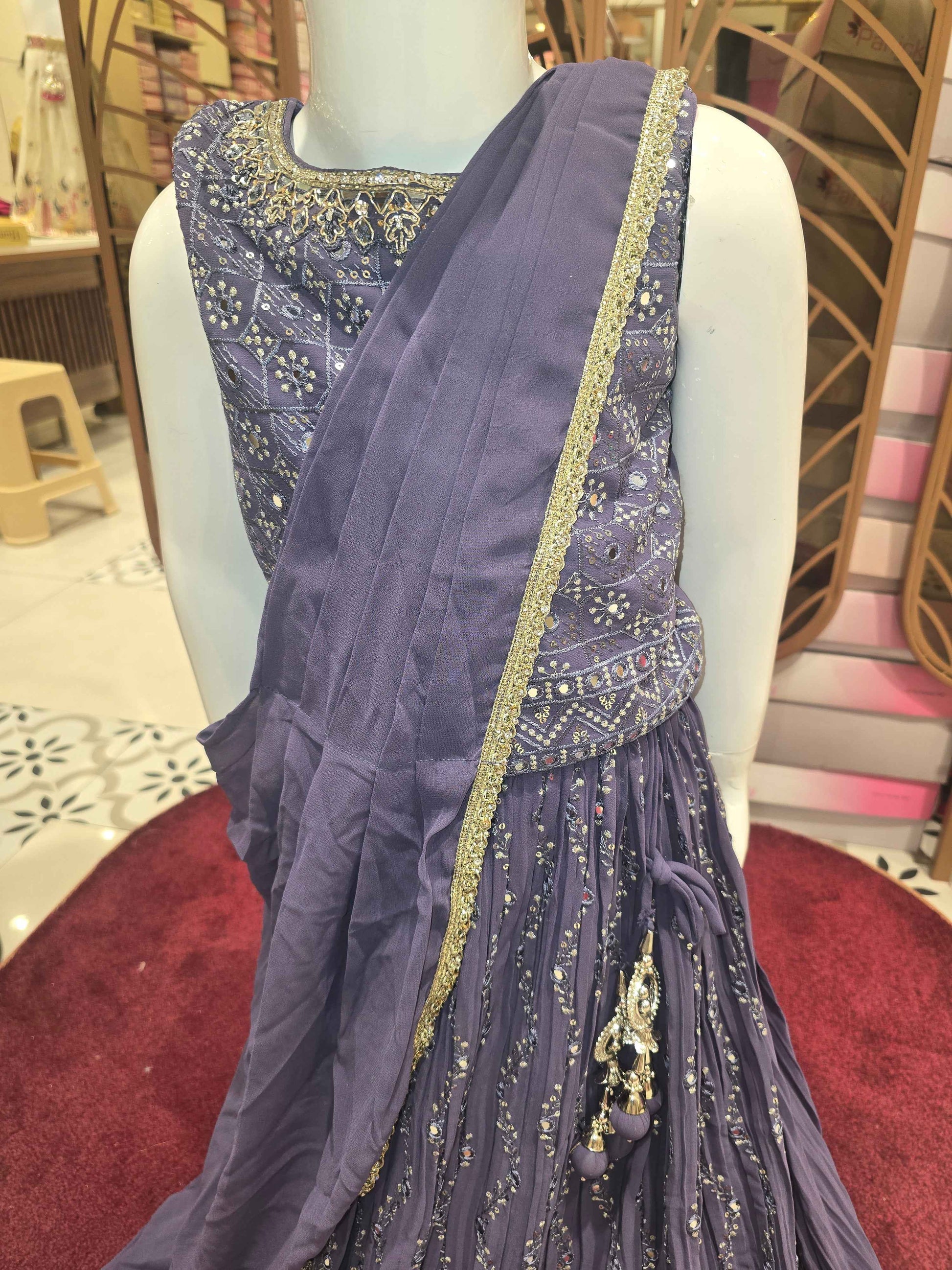 Georgette chiffon material lavender colour gaghra choli with zigzag styled sequence & thread work and handwork on round neck