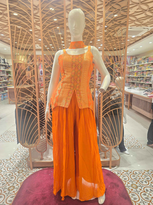 Crush banarasi material orange colour sharara set wuth speghetti neck