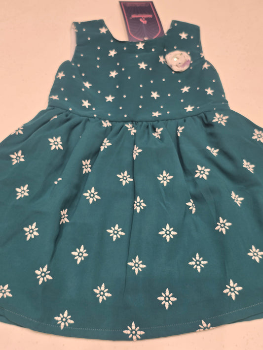 Cotton material peacock blue color baby frock with round neck