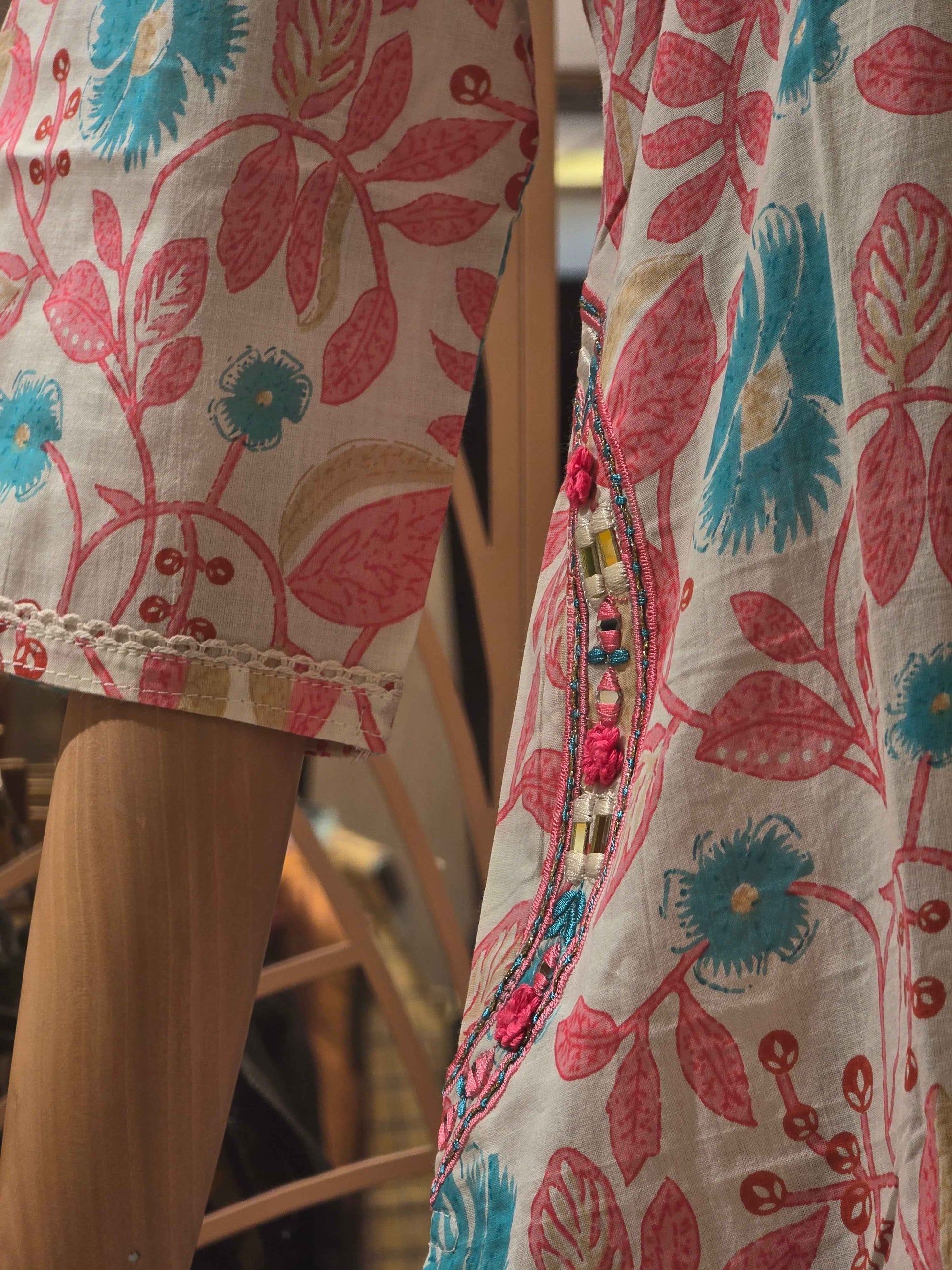 Printed Cotton material half white based with colar neck and pocket