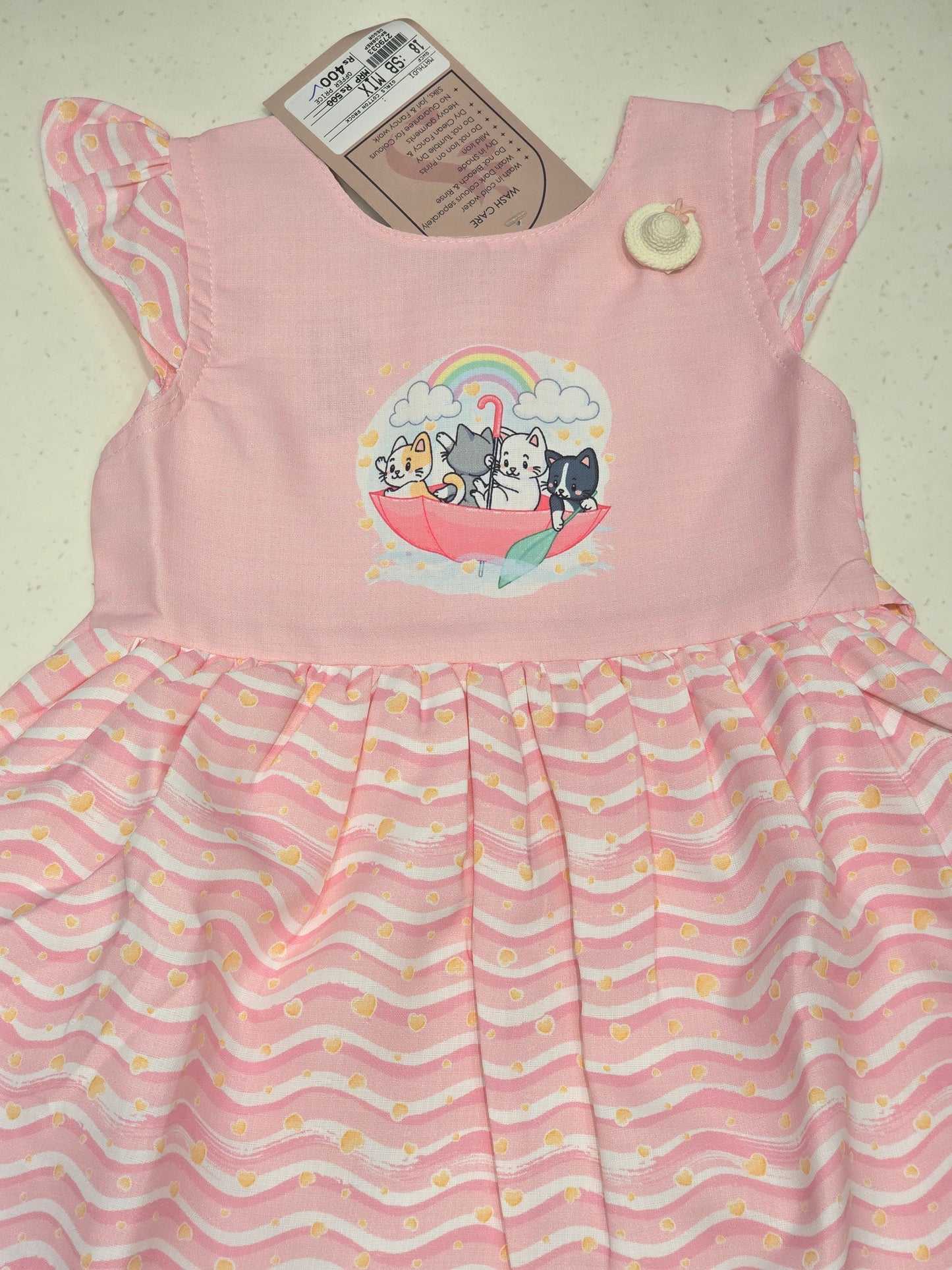 Cotton material babypink with white color frock with mega Sleeves