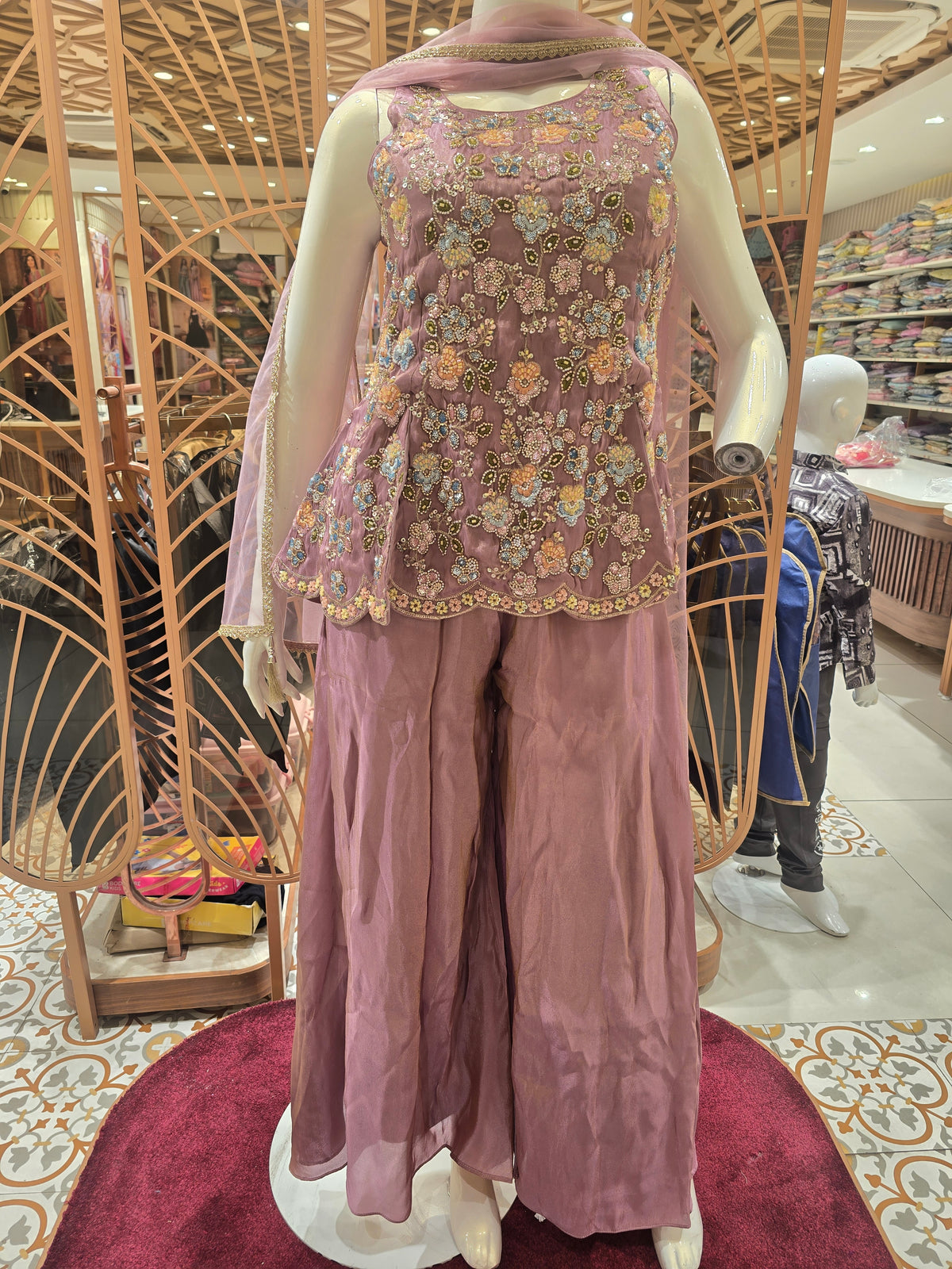 mauve peplum sharara suit.