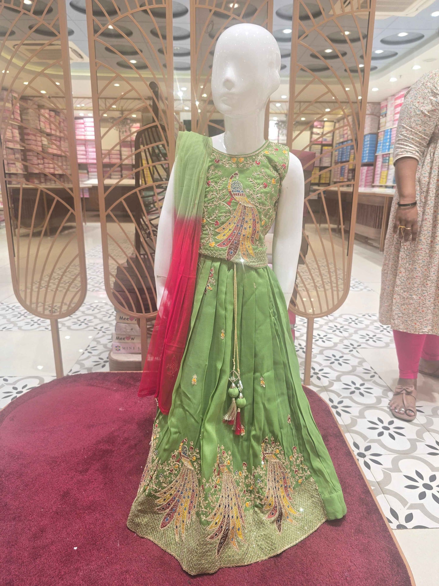 Crape material Parrot green colour gaghra set with peacock design and multi colour zari embroidery