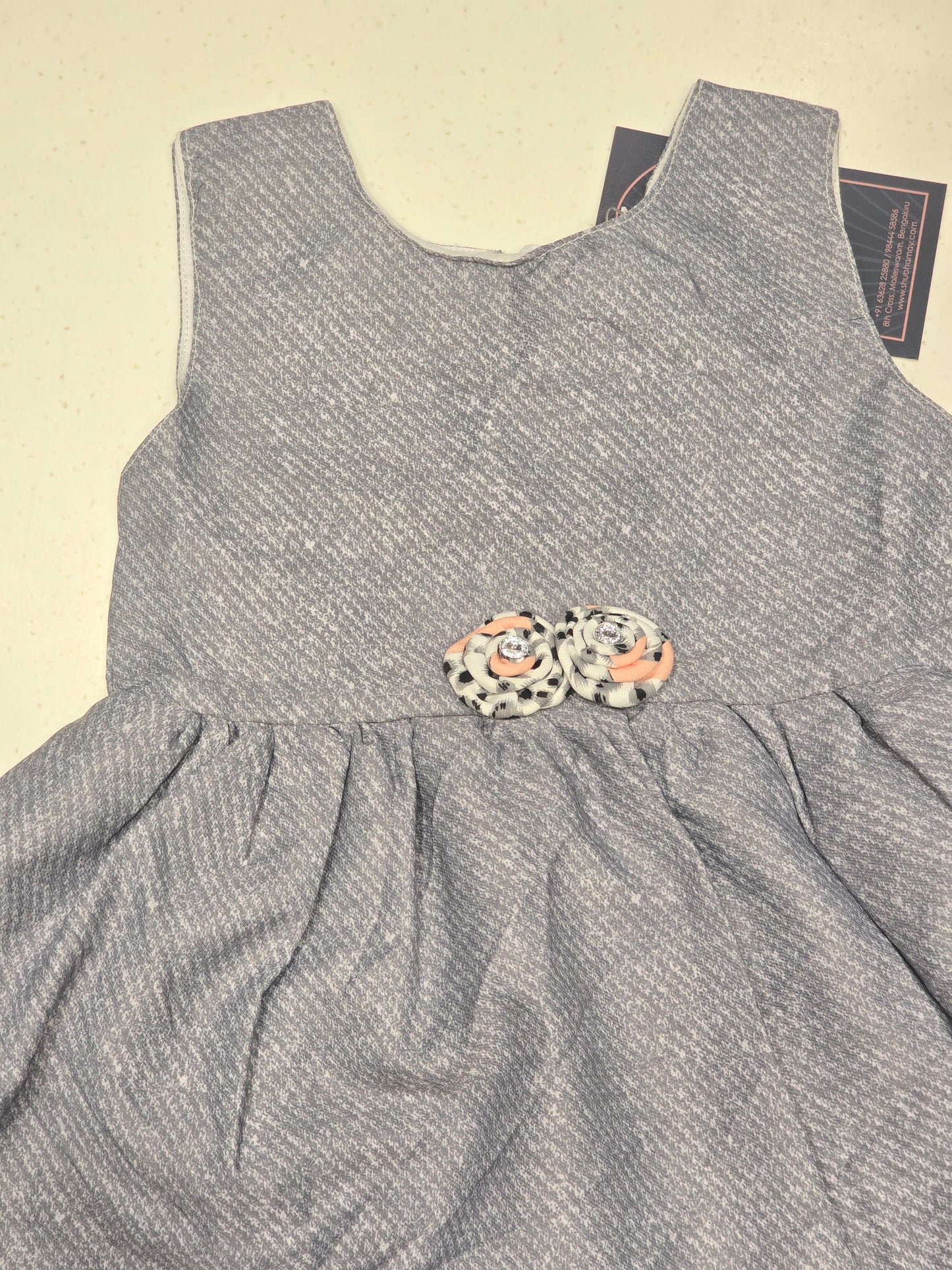 Cotton material gray color baby frock with round neck