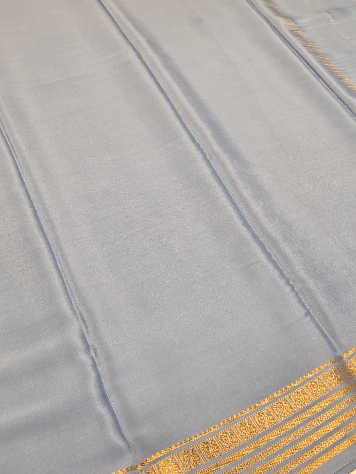 Women Grey Pure Mysore Crepe Silk Self Saree with Peacock Gatti Border