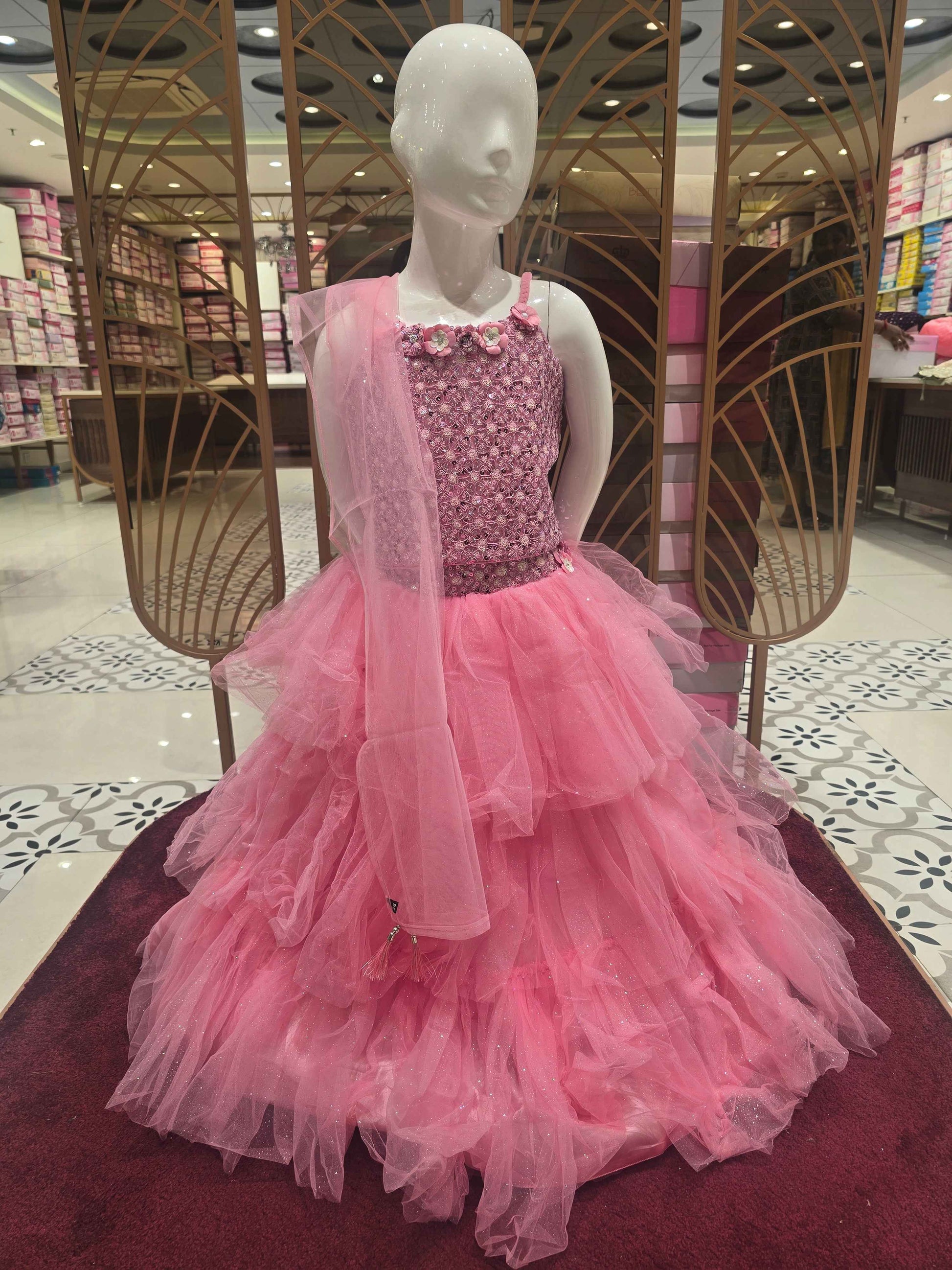 Knitted material baby pink colour traditional wear with sequence work,peghetti shoulder and Step by step gaghra