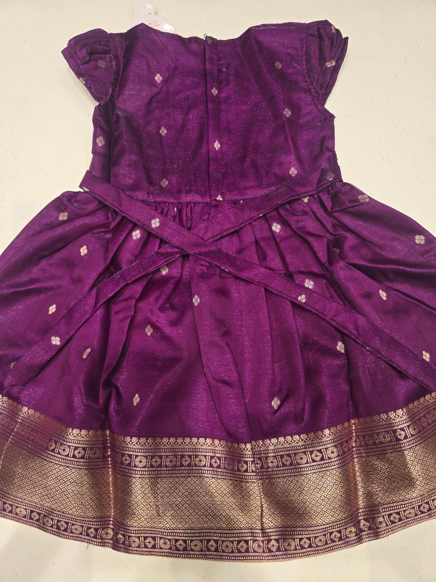 Tissue Material wine color traditional wear with golden zari border