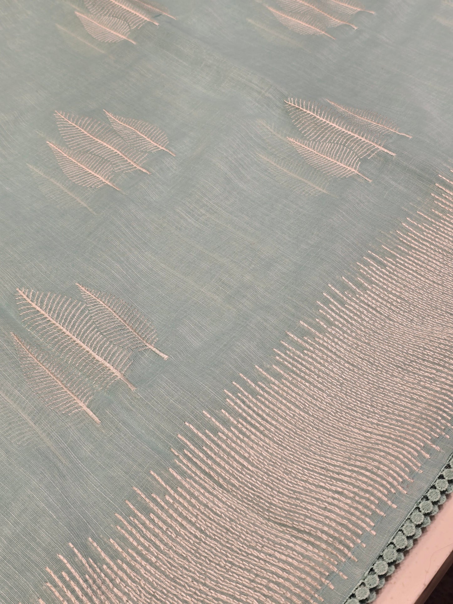 Linen with embroidery border and leaf motif Normal wear