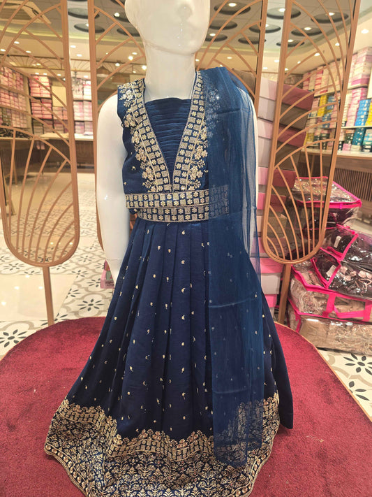 Chinon material Teel blue colour gaghra choli with zari embroidery on v styled neck. Small zari buta and traditional border