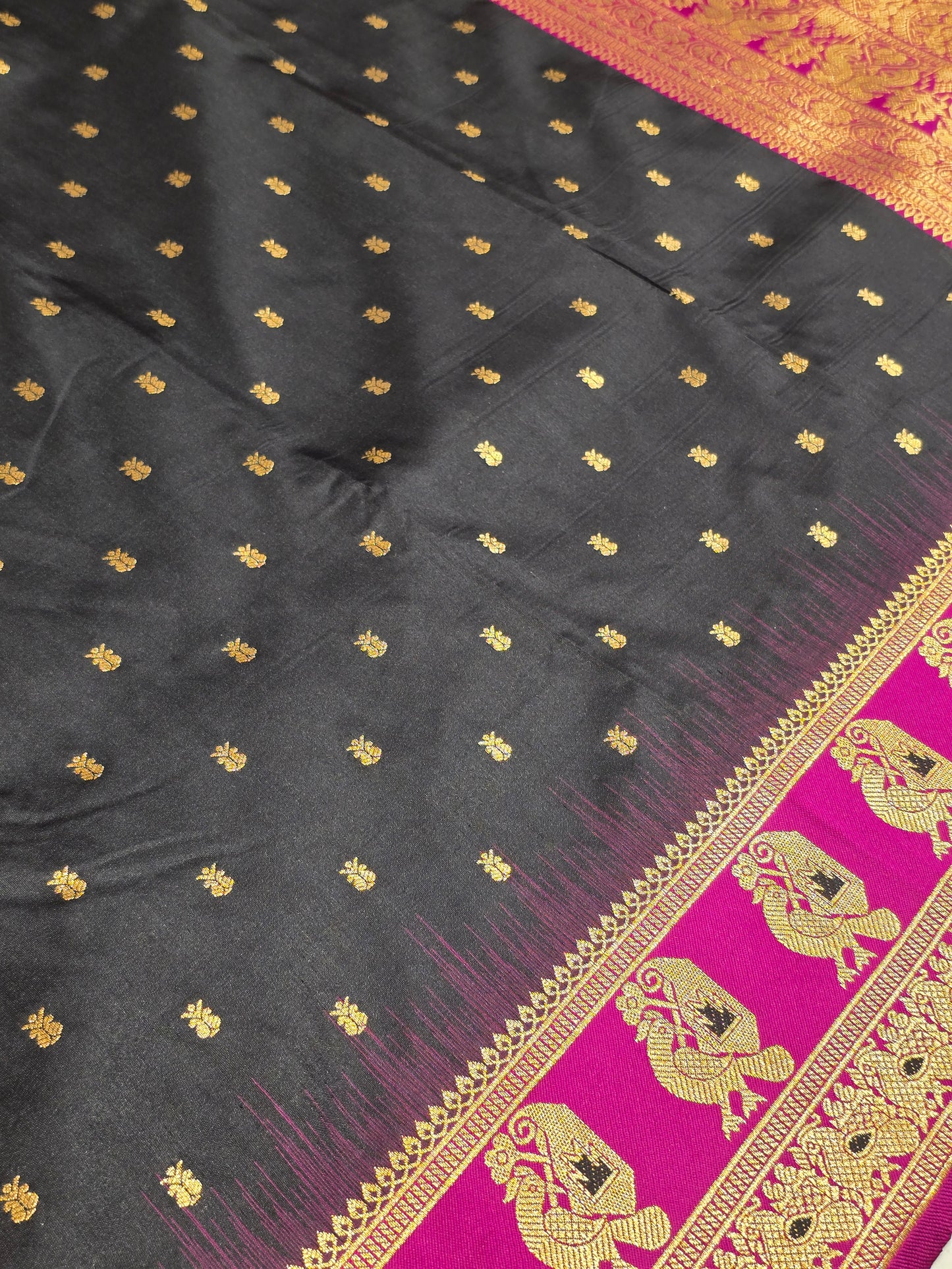 Semi soft silk with butta across the body rich pallu , traditional border