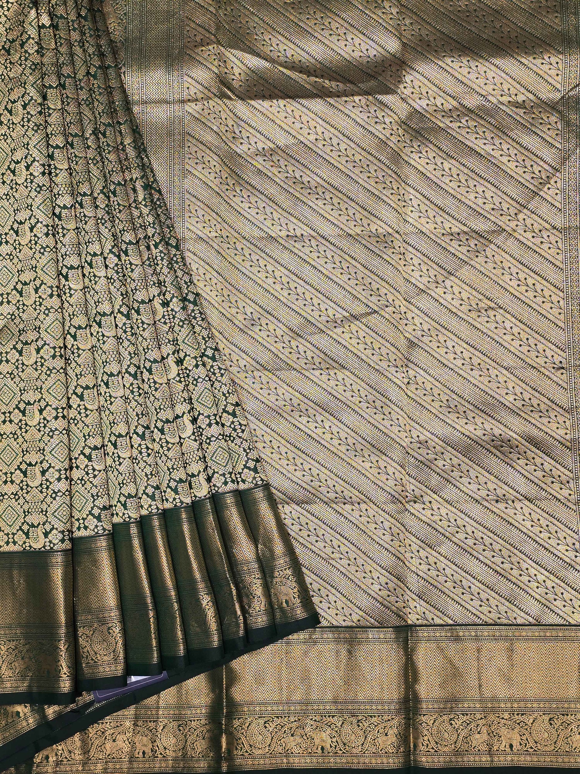 Handloom kanjivaram brocade silk bottle green colour and rich pallu