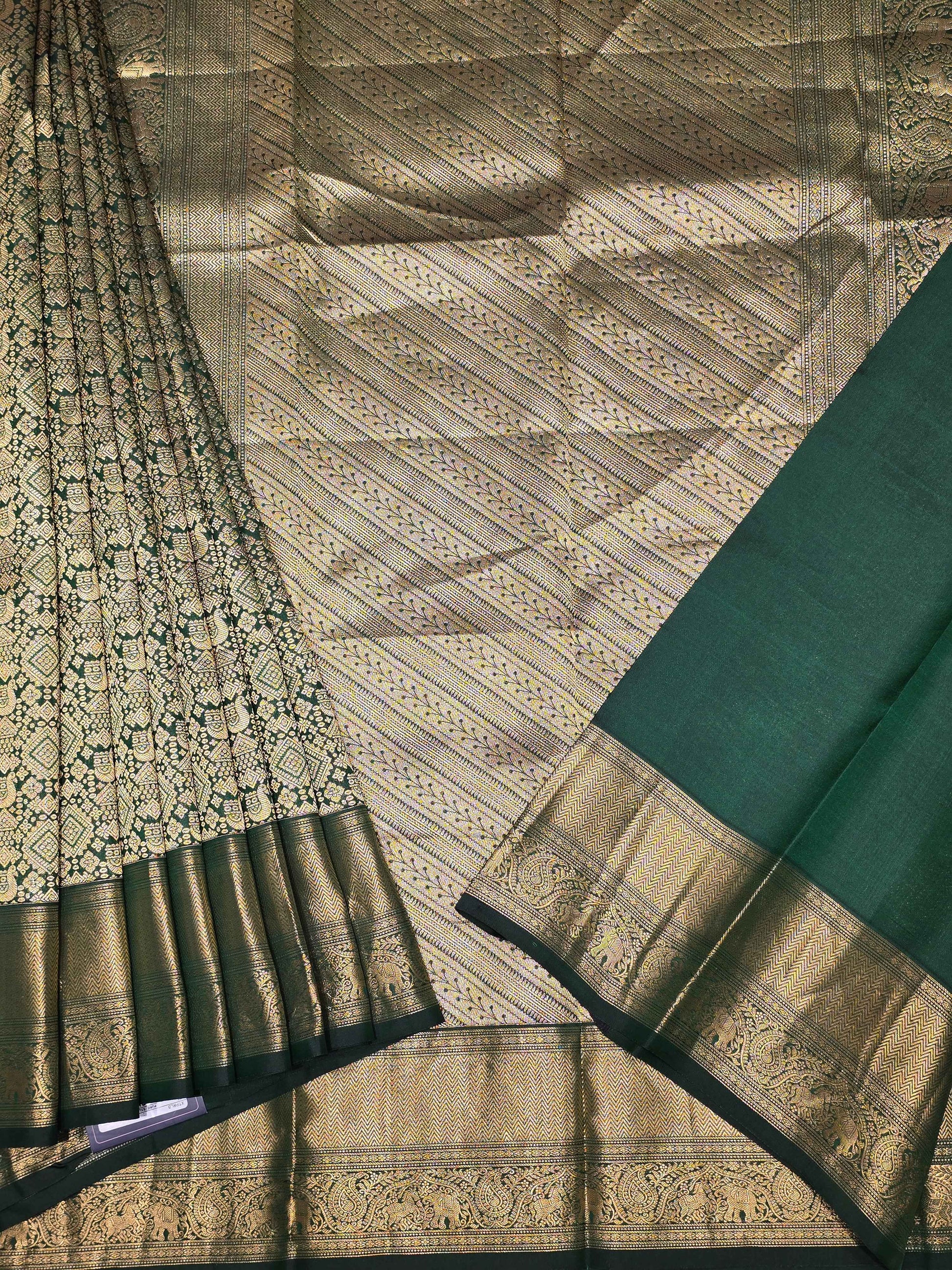 Handloom kanjivaram brocade silk bottle green colour and rich pallu