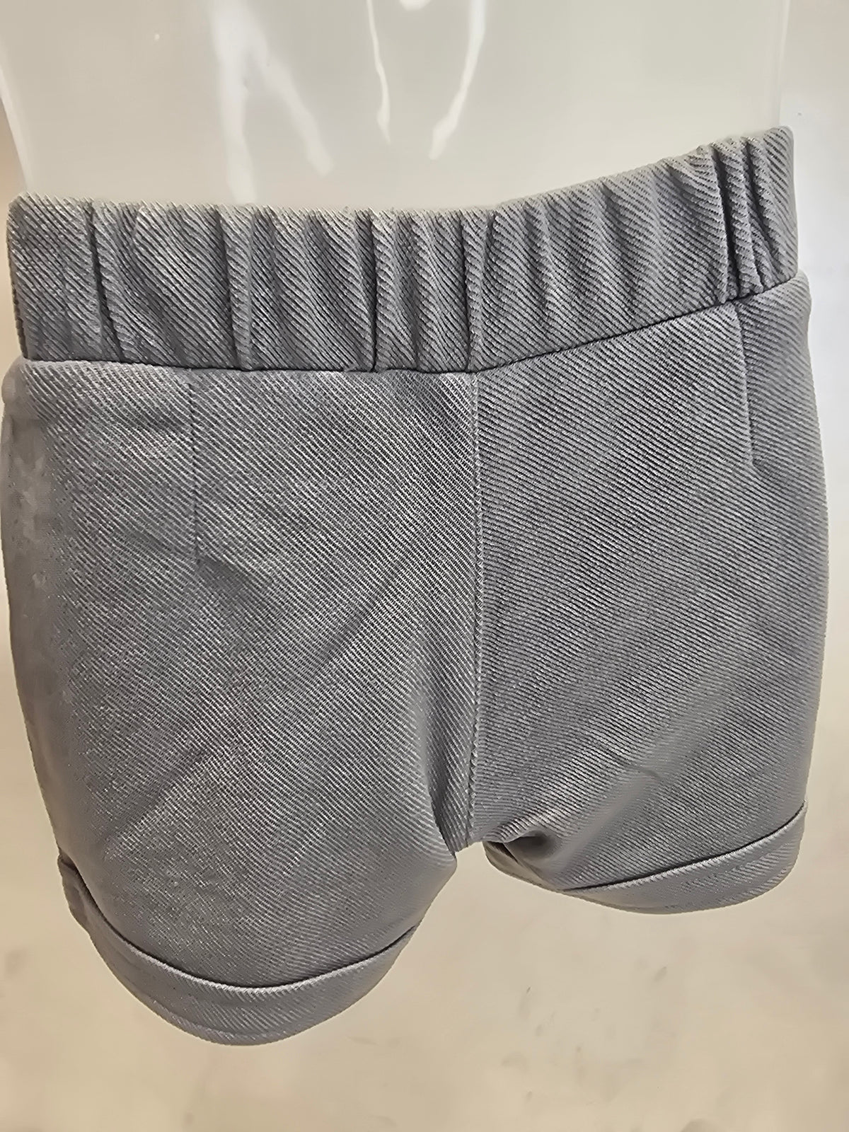 Light Green Lycra Casual Shorts for Girls with Round Elastic Waistband and Stylish Belt Logo Design