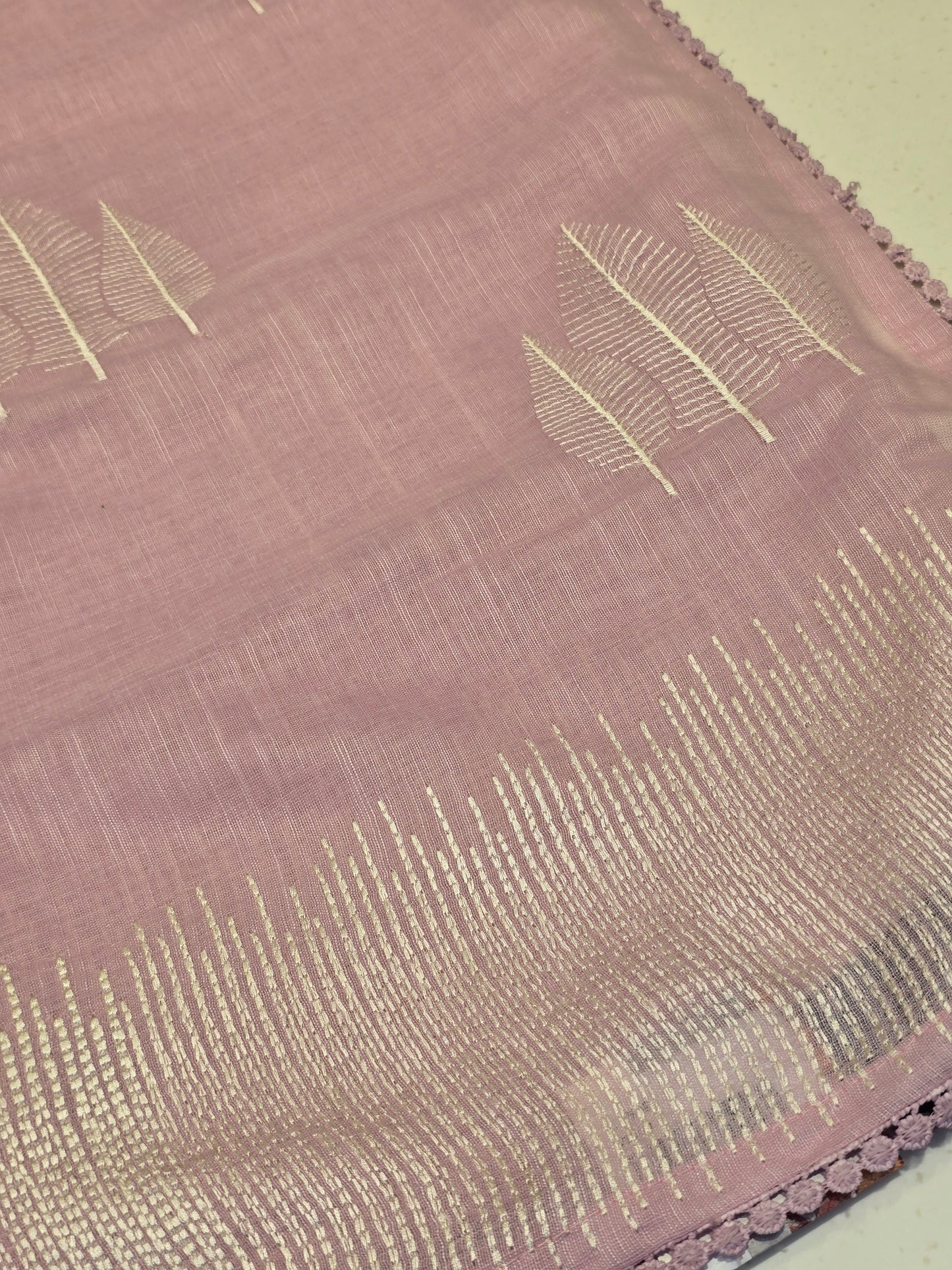 Linen with embroidery border and leaf motif Normal wear