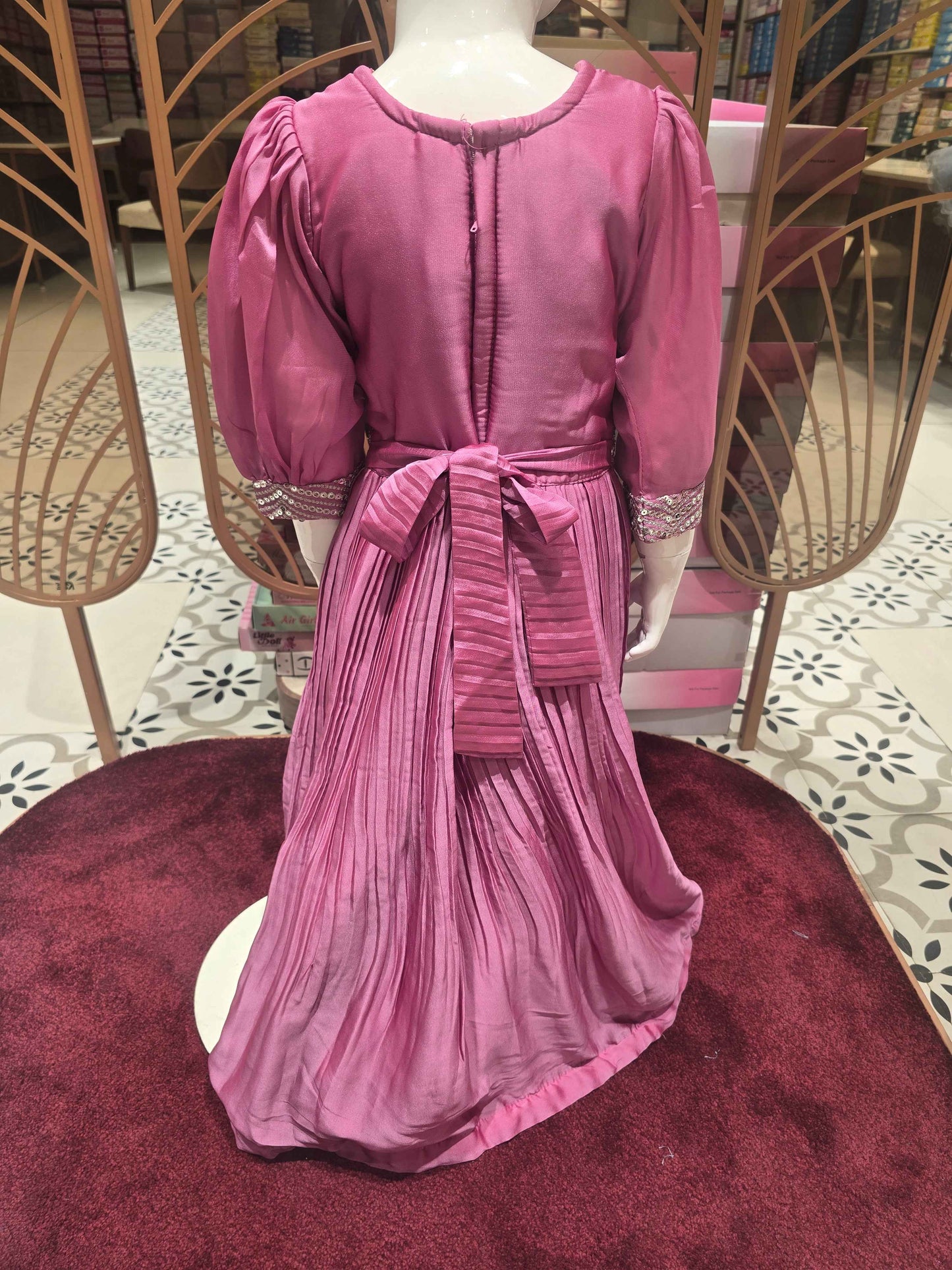 Crush crepe material onion pink color ethnic wear gown with mirror work on neck