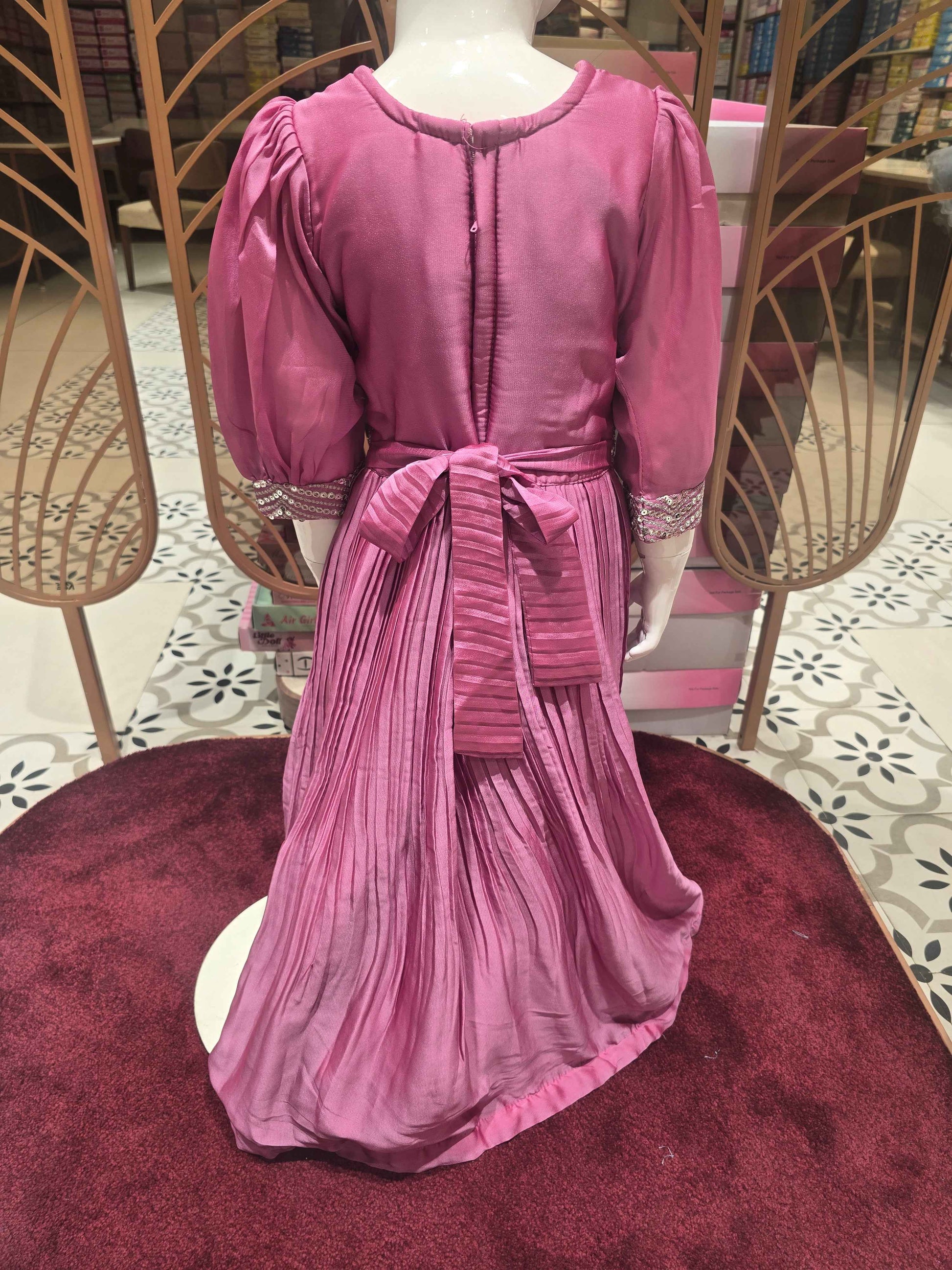Crush crepe material onion pink color ethnic wear gown with mirror work on neck