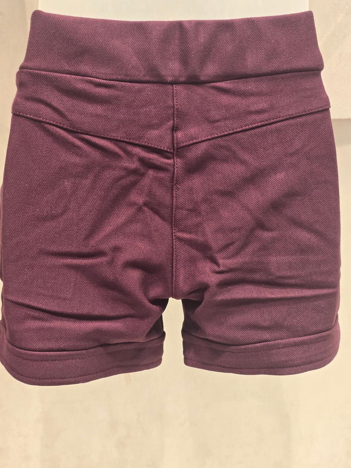 Wine Colored Lycra Cotton Baby Shorts for Girls with Stretchable Fit, Two Pockets and Stylish Belt Logo