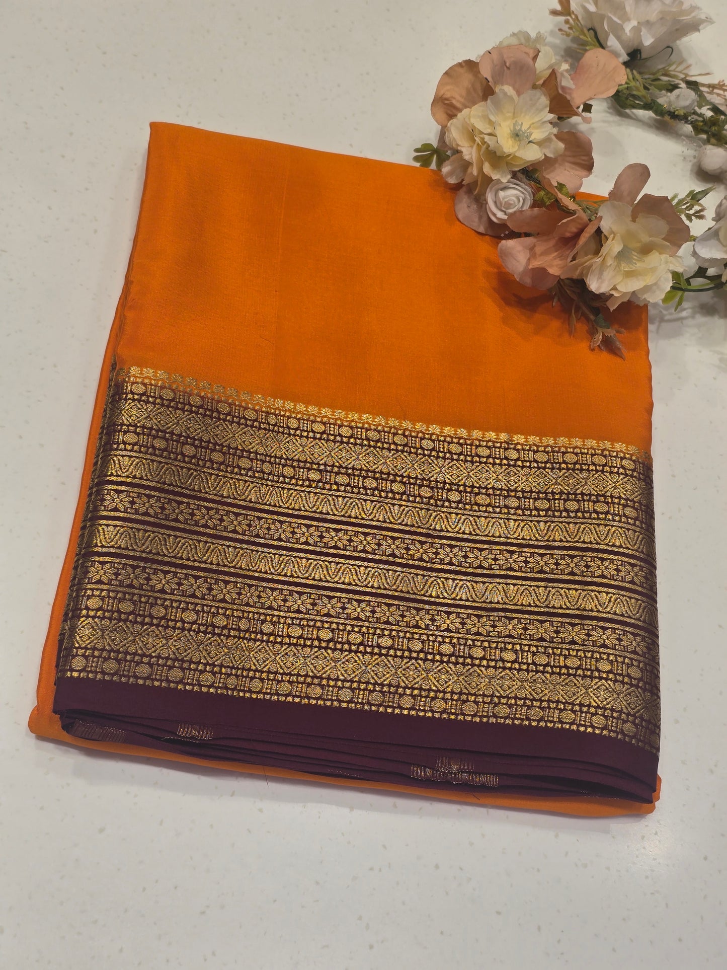 Pure mysore crepe silk with contrast blouse and kaddi pallu , traditional border