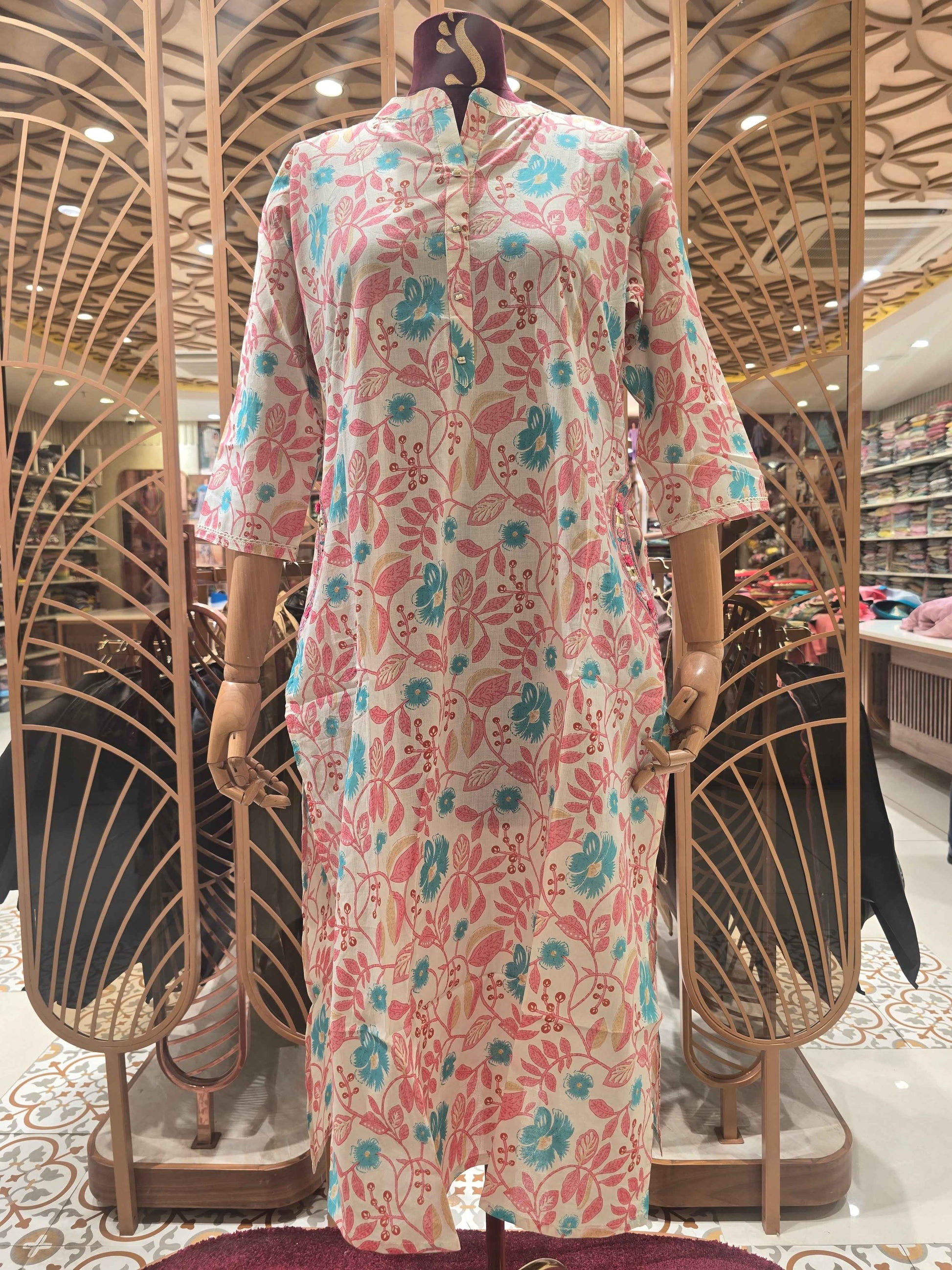 Printed Cotton material half white based with colar neck and pocket