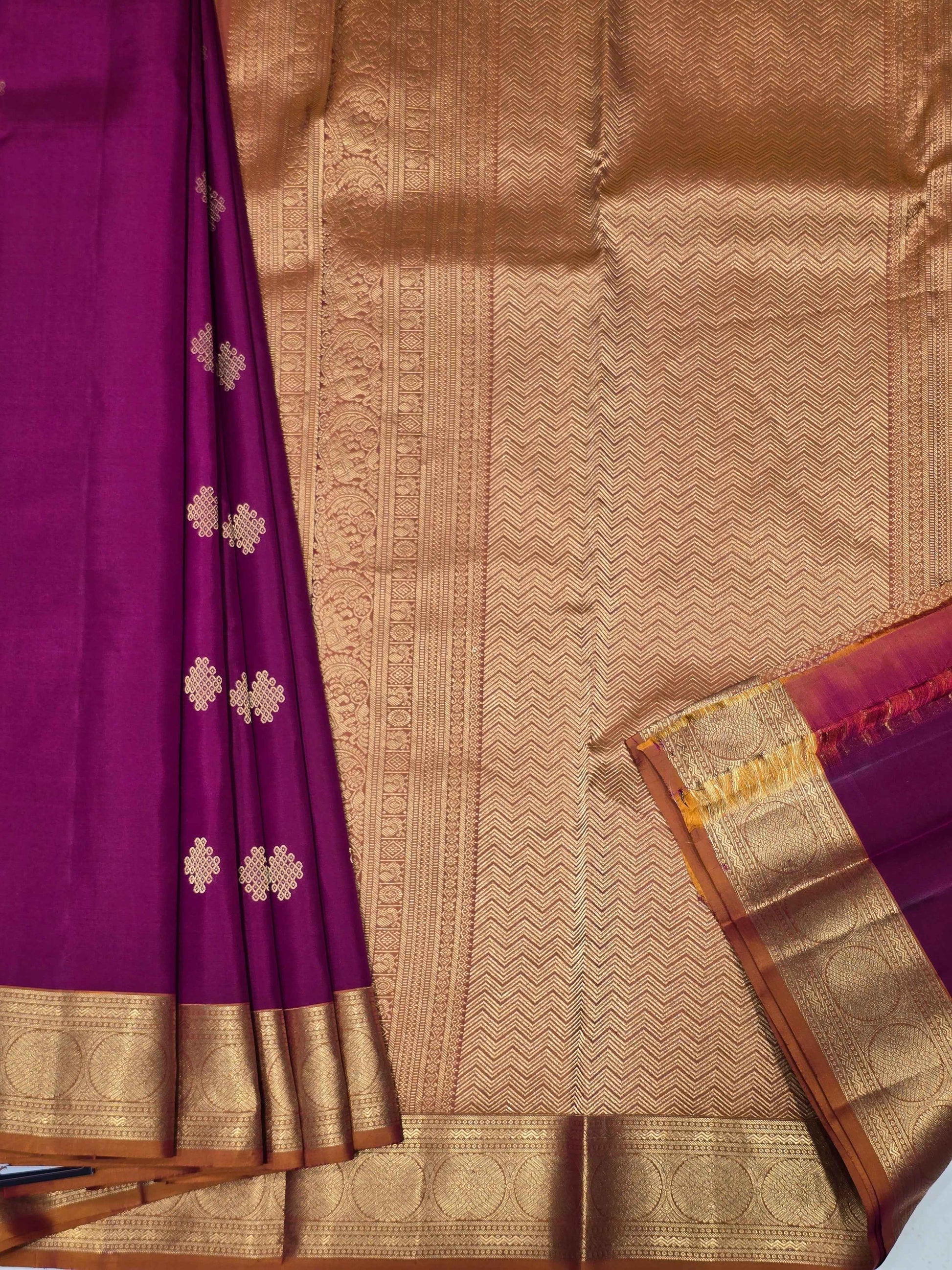 Pure Kanjivaram silk Magenta color saree with kolam butta