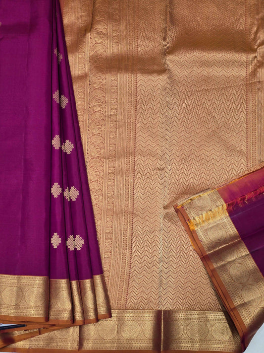 Pure Kanjivaram silk Magenta color saree with kolam butta