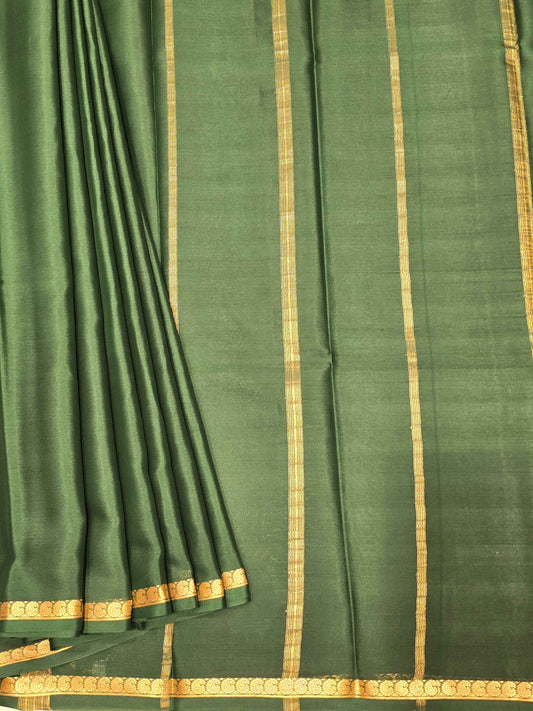 Pure mysore crepe silk bottle green colour and kaddi pallu