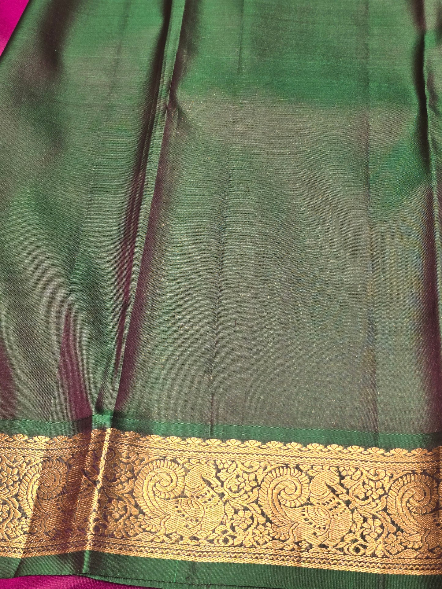 Handloom pure Kanjivaram silk with small leaf styled motifs and small traditional peacock designed border, rich pallu