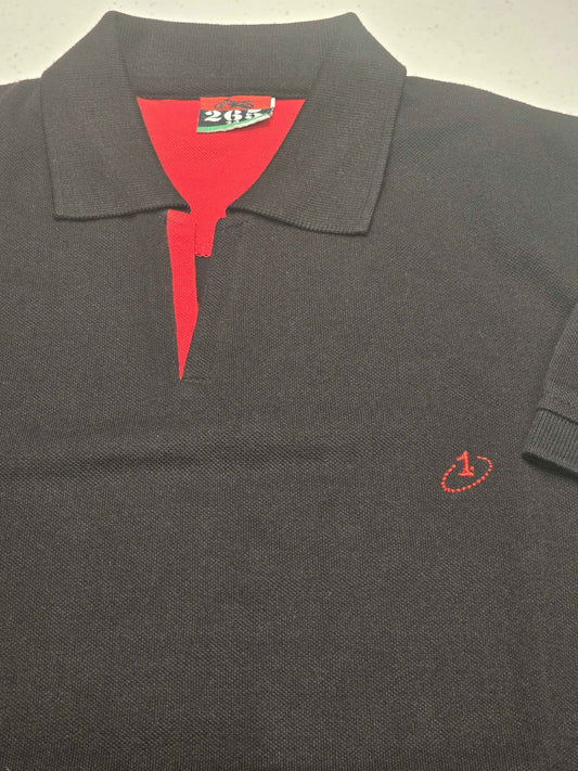 black or dark charcoal knit polo shirt featuring a red contrast inner placket and an embroidered chest logo
