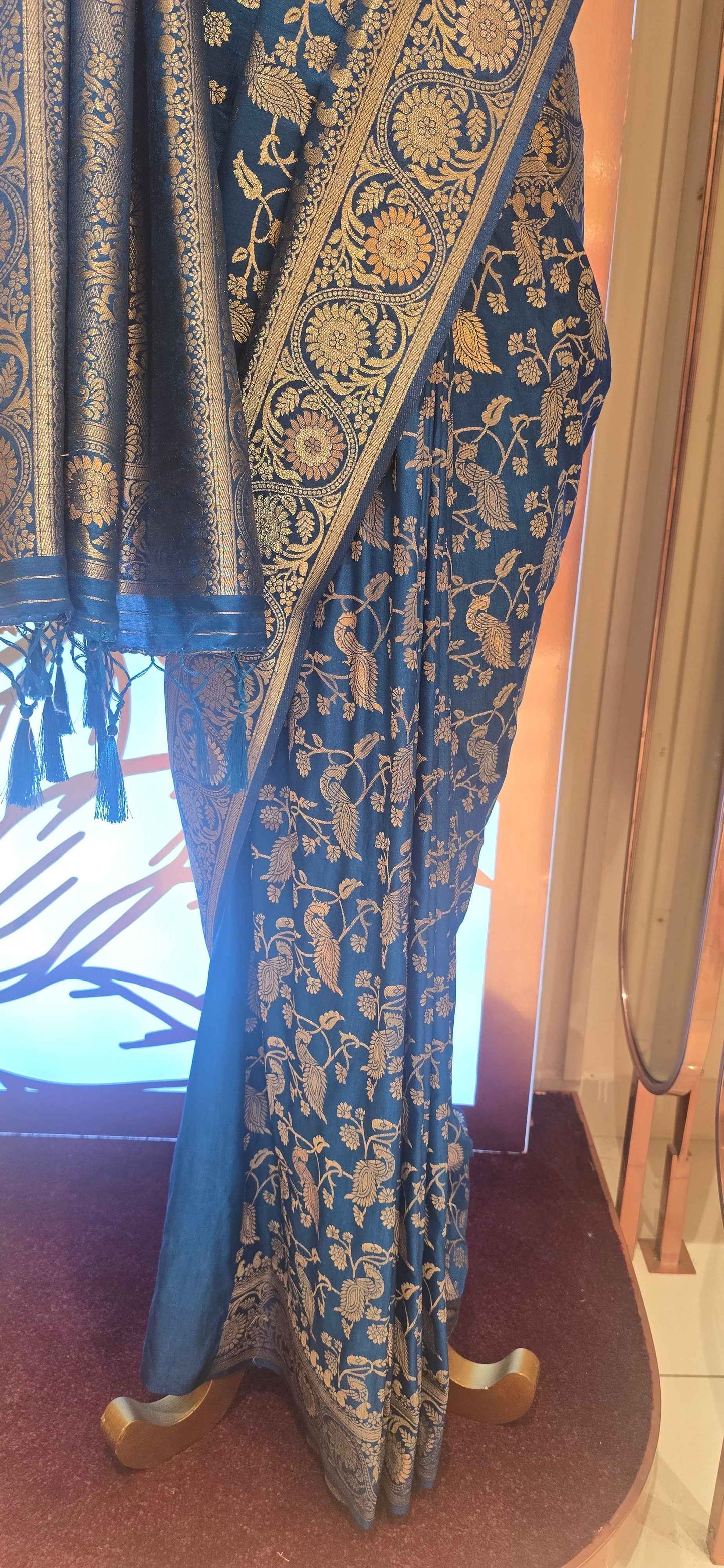 Banarasi material peacock blue color saree with jawl design and rich pallu
