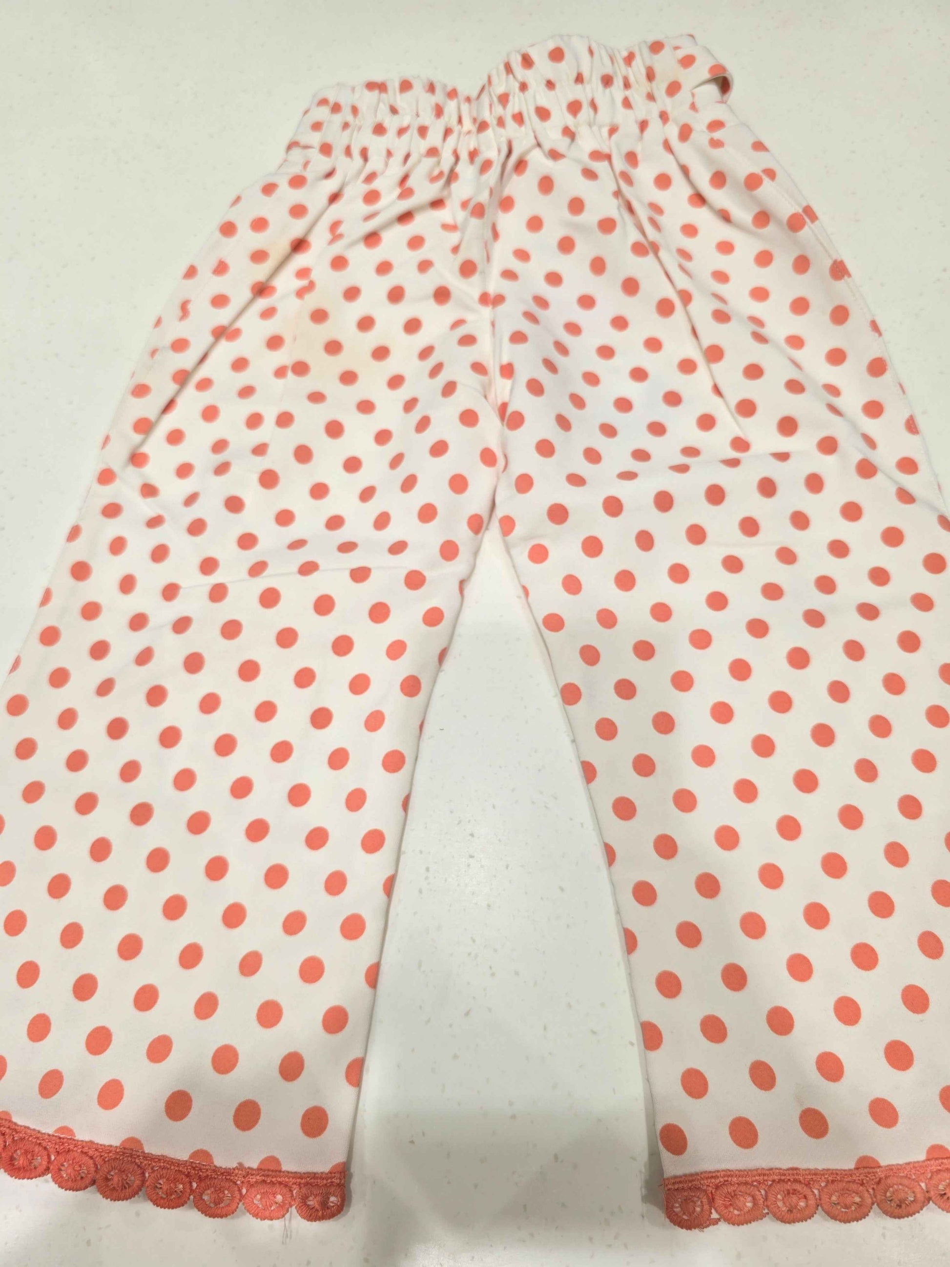 Cotton material white based with peach polka dots