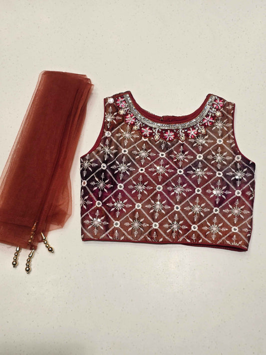 traditional girls' maroon and brown shades lehenga choli set.