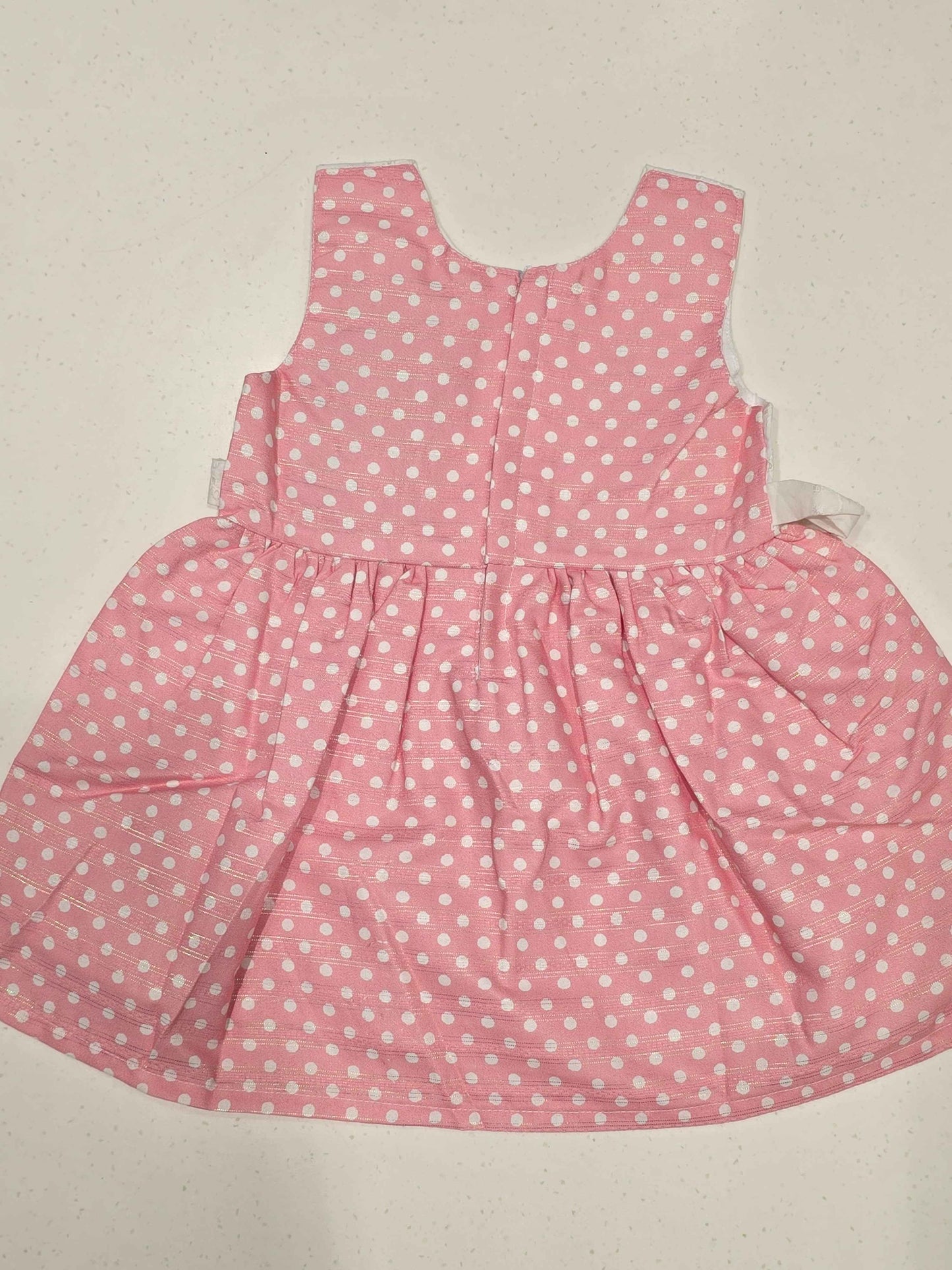 sleeveless, fit-and-flare baby cotton frock dress featuring a color-blocked style.
