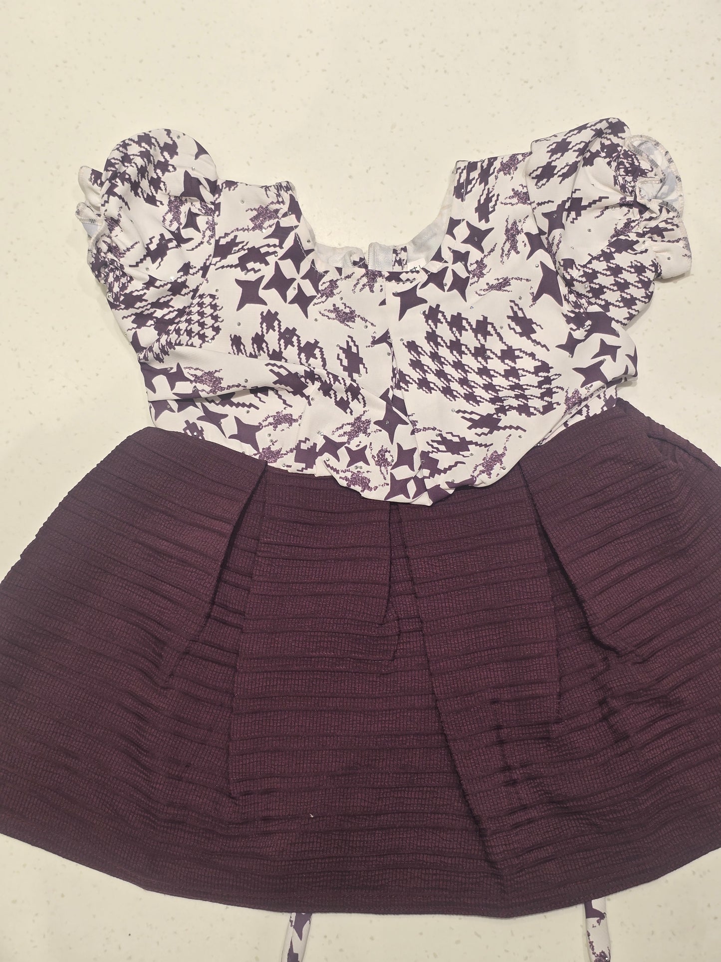 Cotton material white with wine color baby frock with buff Sleeve