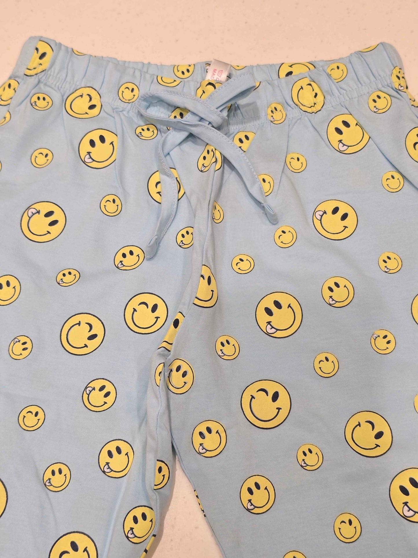 Printed Cotton material sky blue colour capri with smily face