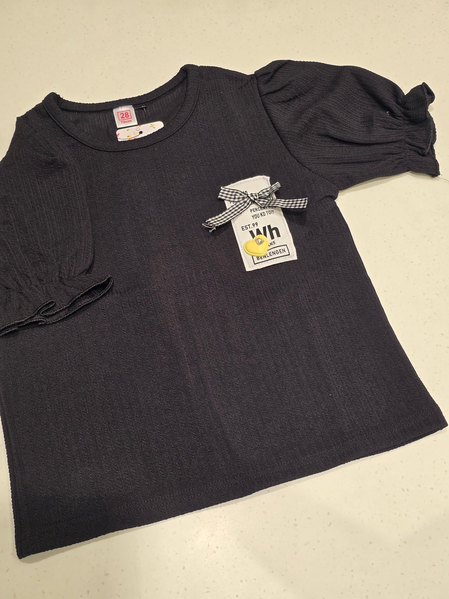 black kids' ribbed knit top,