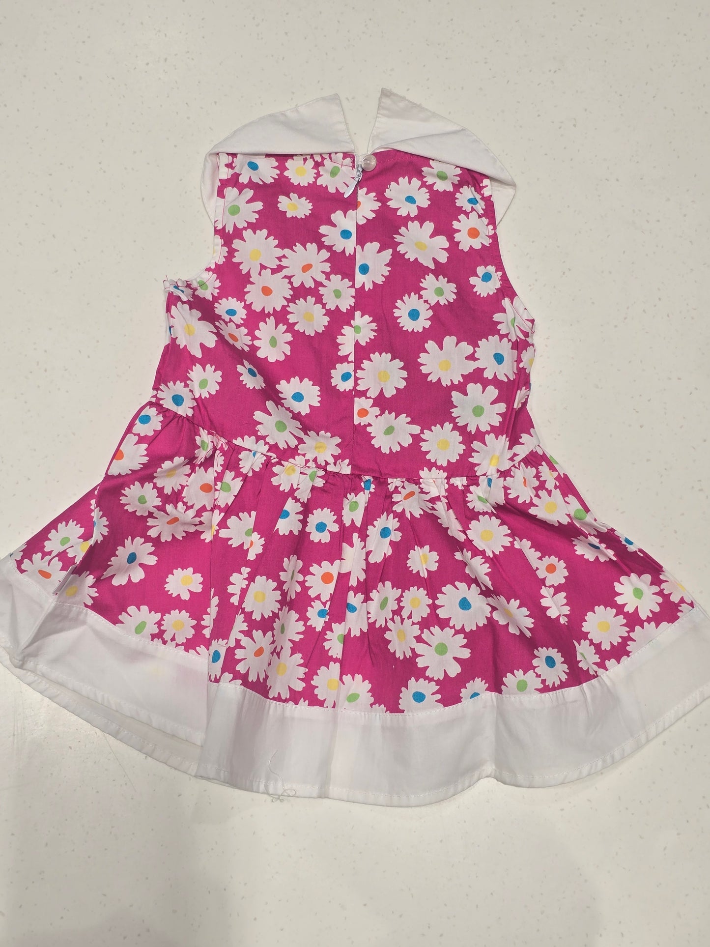 Printed Cotton material baby frock with flower prints and white bow