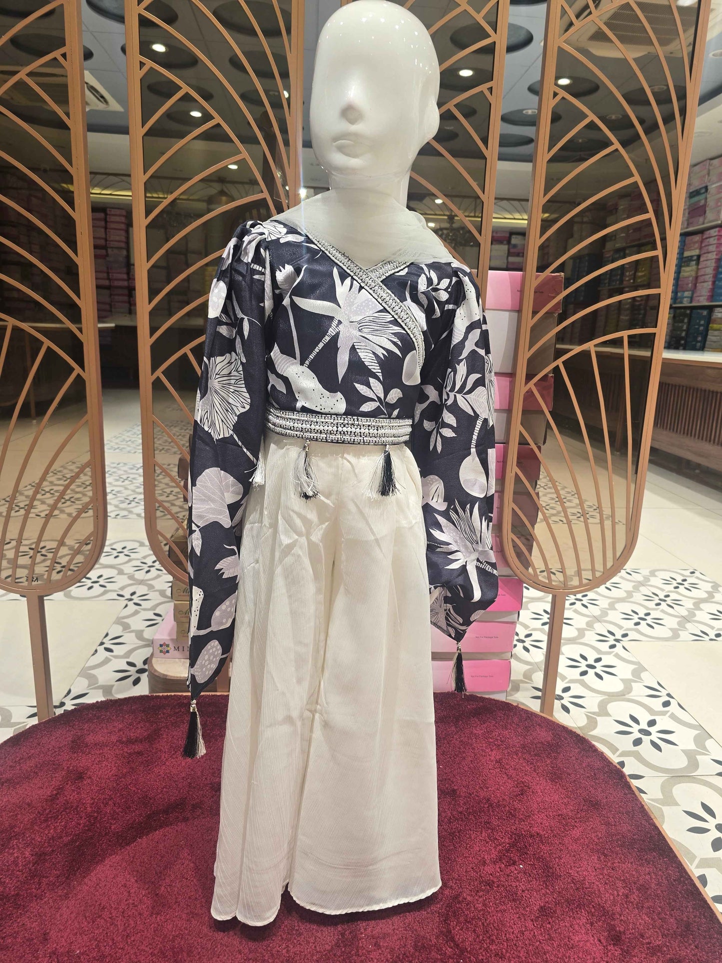 Crepe material black with halfwhite color party wear with bell sleeve