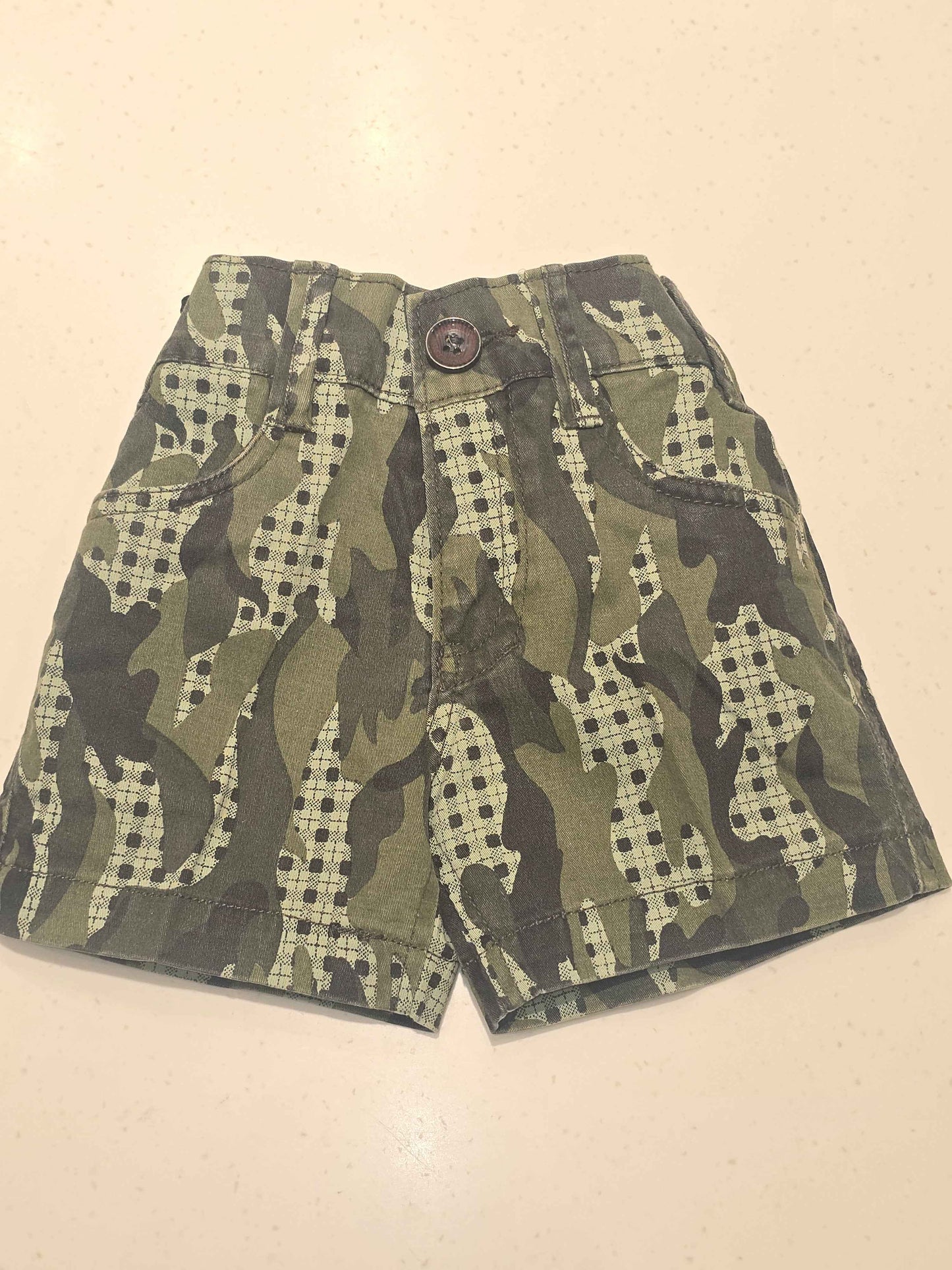 Denim material green printed shorts with stylish pocket bottons