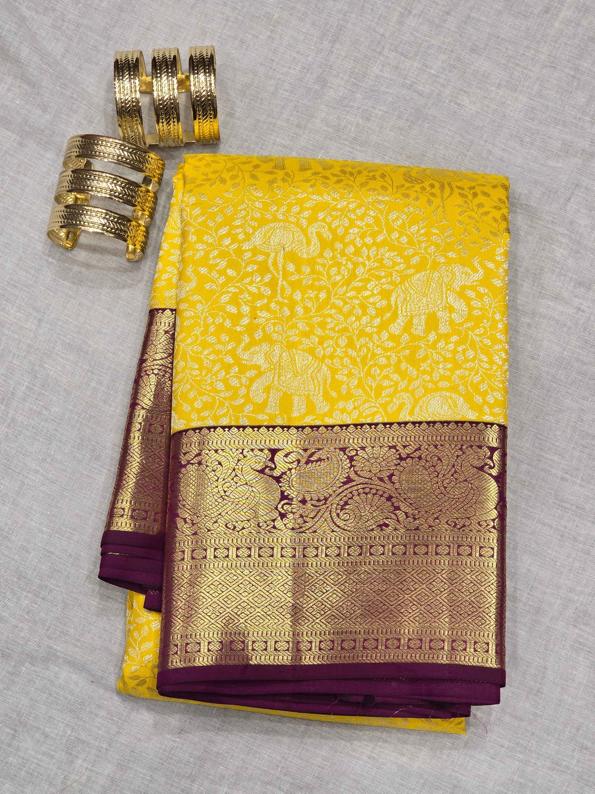 Pure  handloom Kanjivaram brocade silk saree with traditional border and contrast blouse