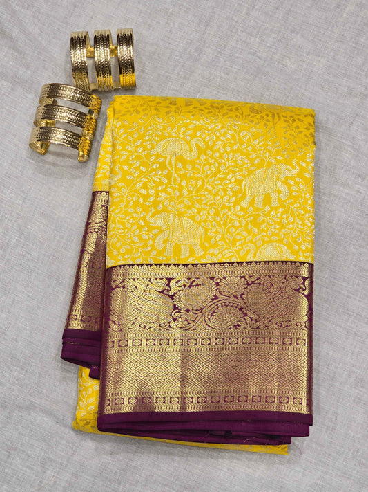 Pure  handloom Kanjivaram brocade silk saree with traditional border and contrast blouse