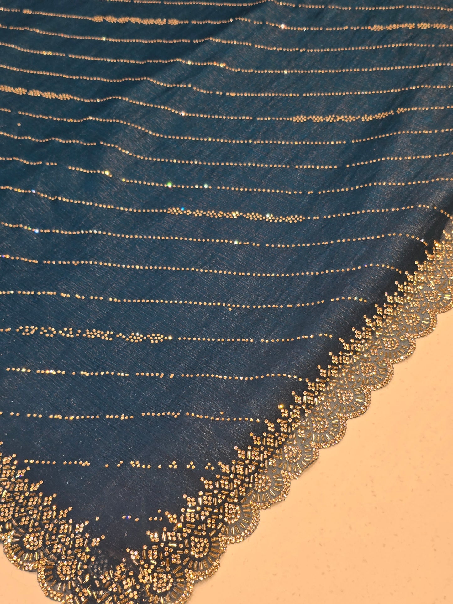 Stone work with leharia design and rich blouse