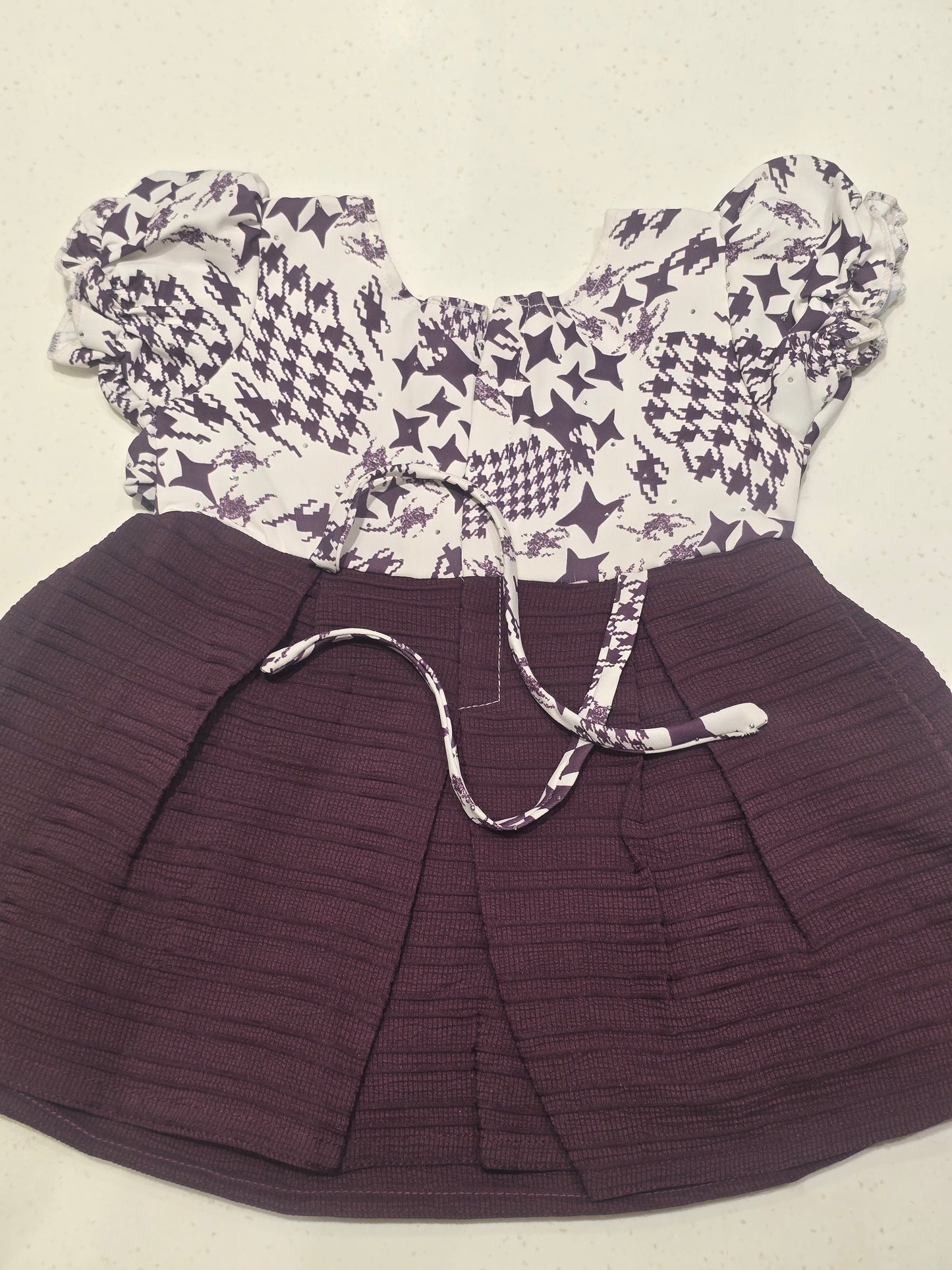 Cotton material white with wine color baby frock with buff Sleeve