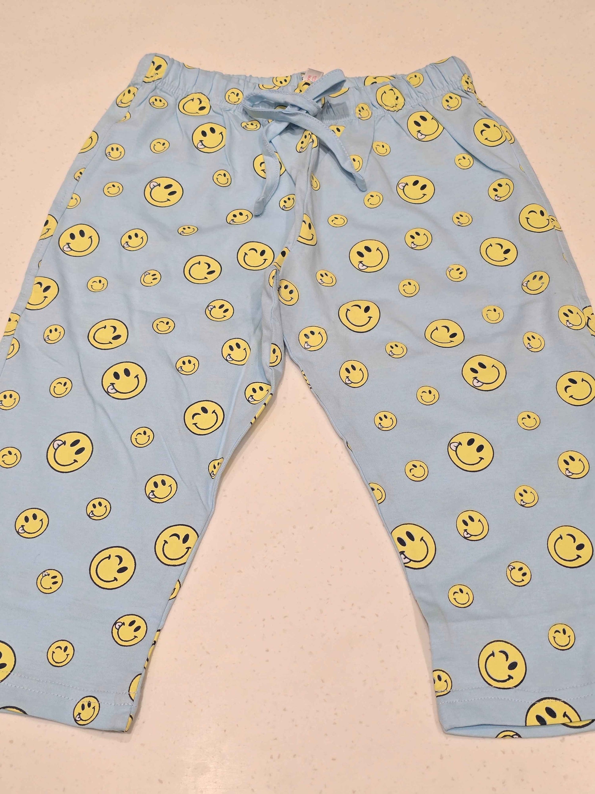 Printed Cotton material sky blue colour capri with smily face