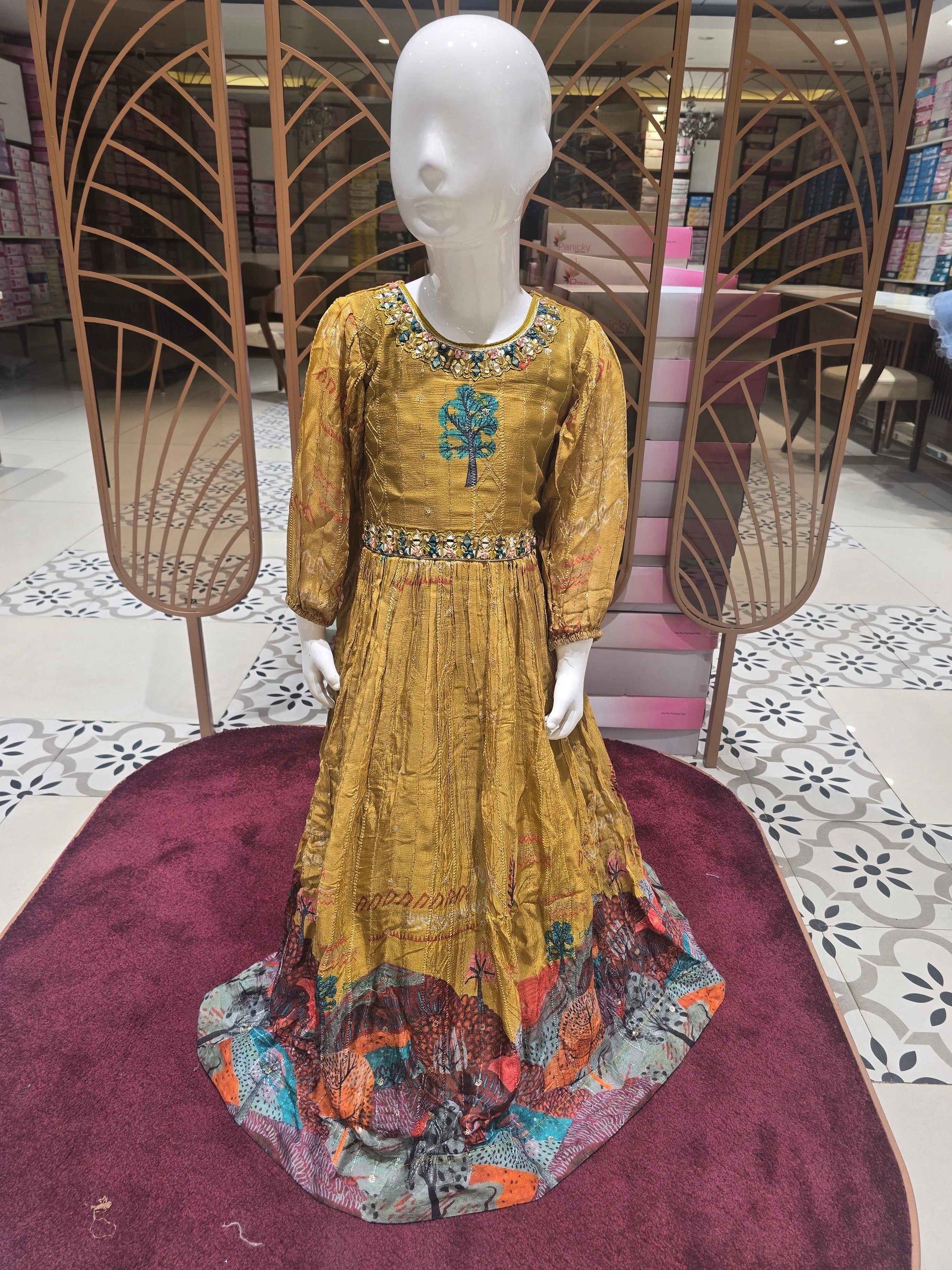 Crepe sequence material mustred color ethnic wear gown with mirror work on neck and waist