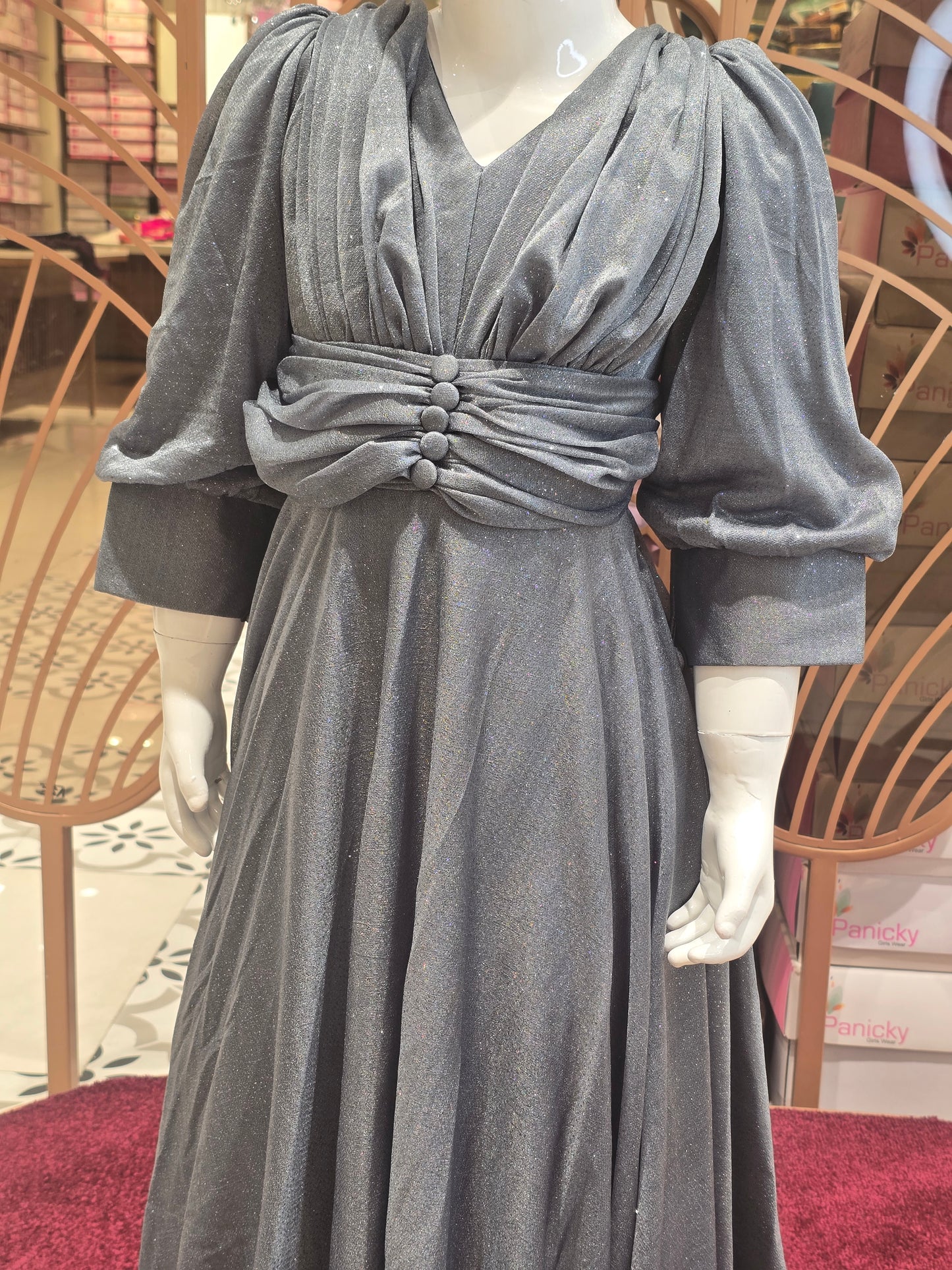 Elephant Grey Shimmer Western Party Wear Gown for Girls with ¾ Buff Sleeves, Modern Button Detailing and Long Waist Tie