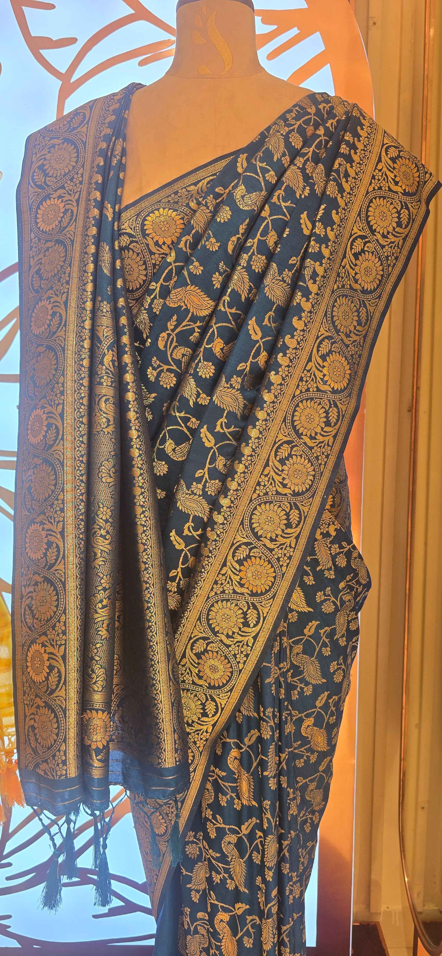 Banarasi material peacock blue color saree with jawl design and rich pallu